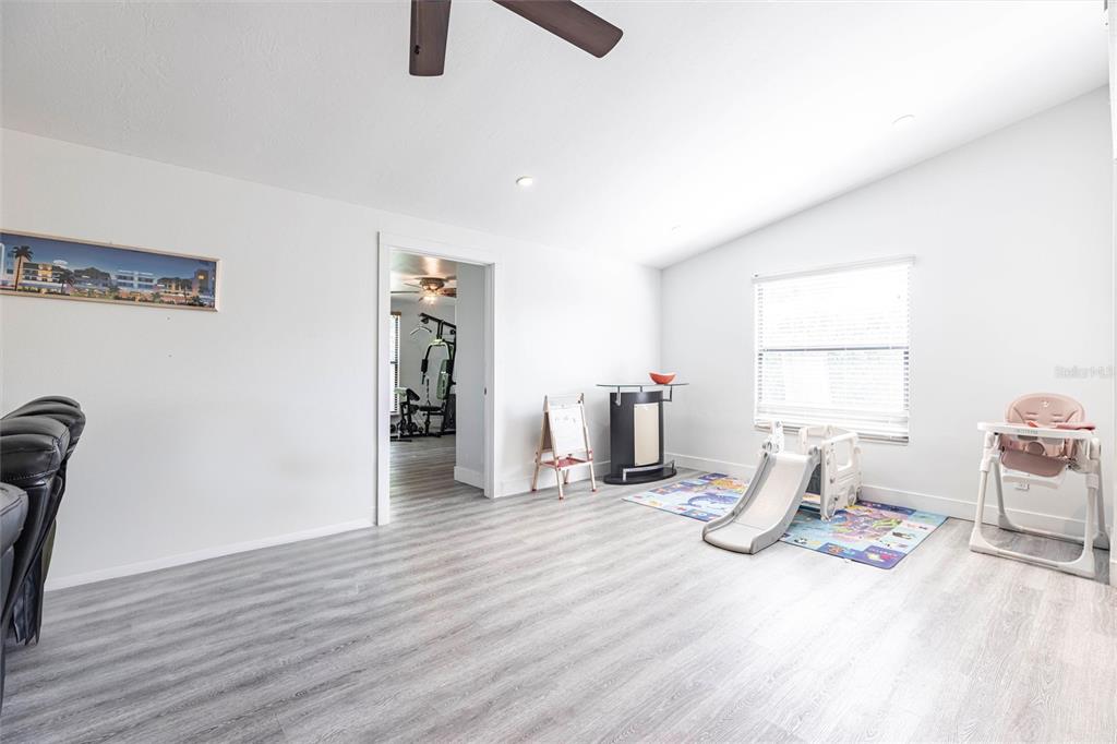 2345 Outrigger Lane Naples, FL 34104 - Photo 11 of 37 a view of a livingroom with dishwasher and workspace