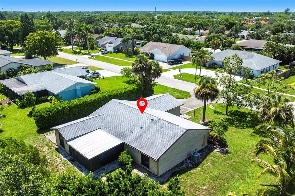 2345 Outrigger Lane Naples, FL 34104 - Photo 30 of 37 an aerial view of a house with swimming pool garden and patio