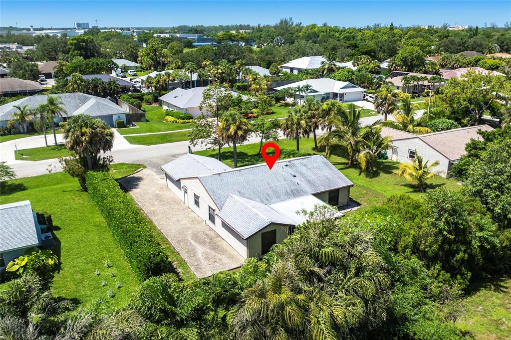 2345 Outrigger Lane Naples, FL 34104 - Photo 31 of 37 an aerial view of residential houses with outdoor space and street view