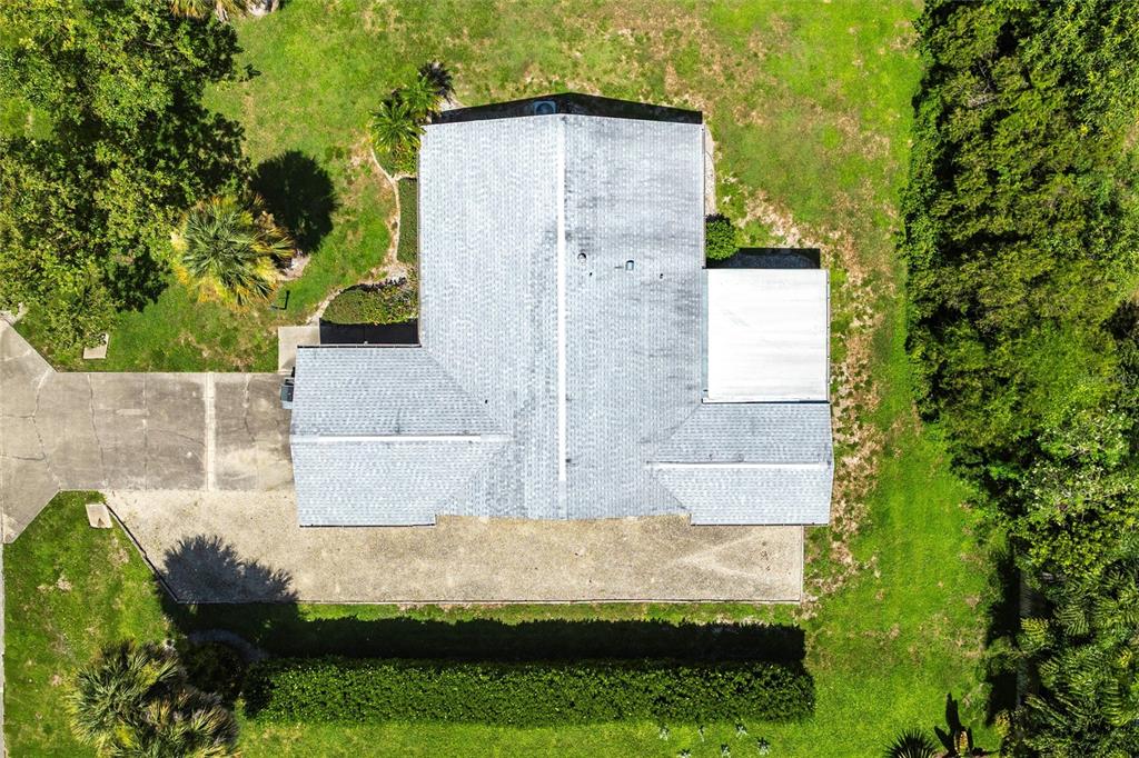 2345 Outrigger Lane Naples, FL 34104 - Photo 32 of 37 a view of back yard of the house