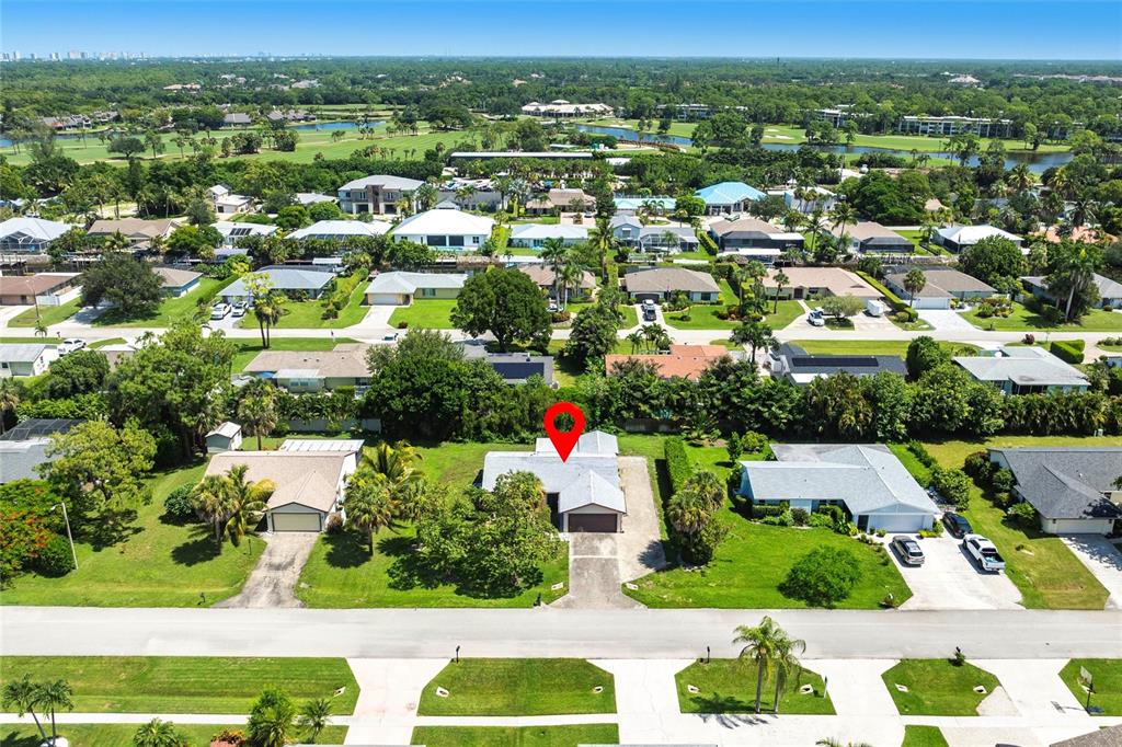 2345 Outrigger Lane Naples, FL 34104 - Photo 33 of 37 an aerial view of residential houses with outdoor space