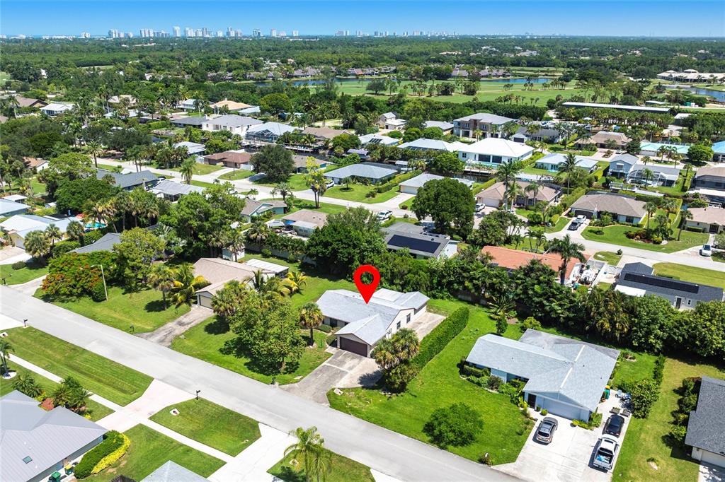 2345 Outrigger Lane Naples, FL 34104 - Photo 34 of 37 an aerial view of residential houses with outdoor space and street view