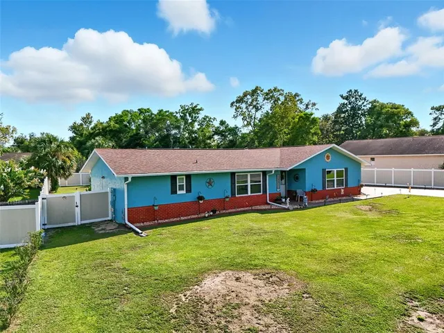 a house view with a garden space