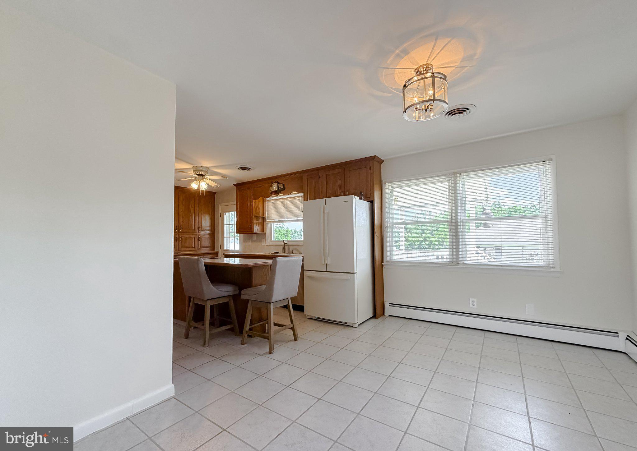 23230 Colton Point Road Avenue, MD 20609 - Photo 12 of 63 Bright and airy kitchen space.