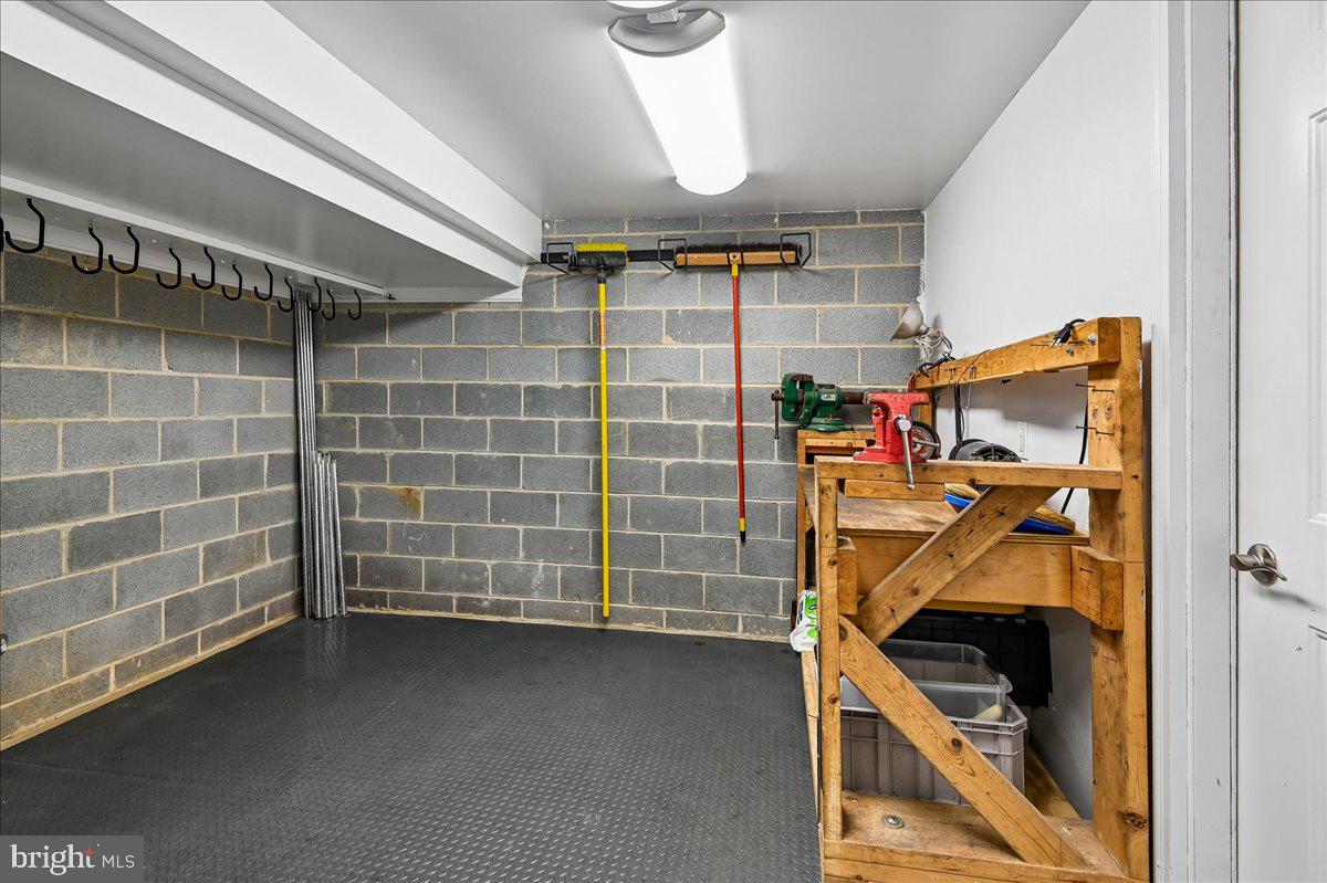 3633 Patuxent River Road Davidsonville, MD 21035 - Photo 63 of 85 Enclosed Workshop Room with Bench