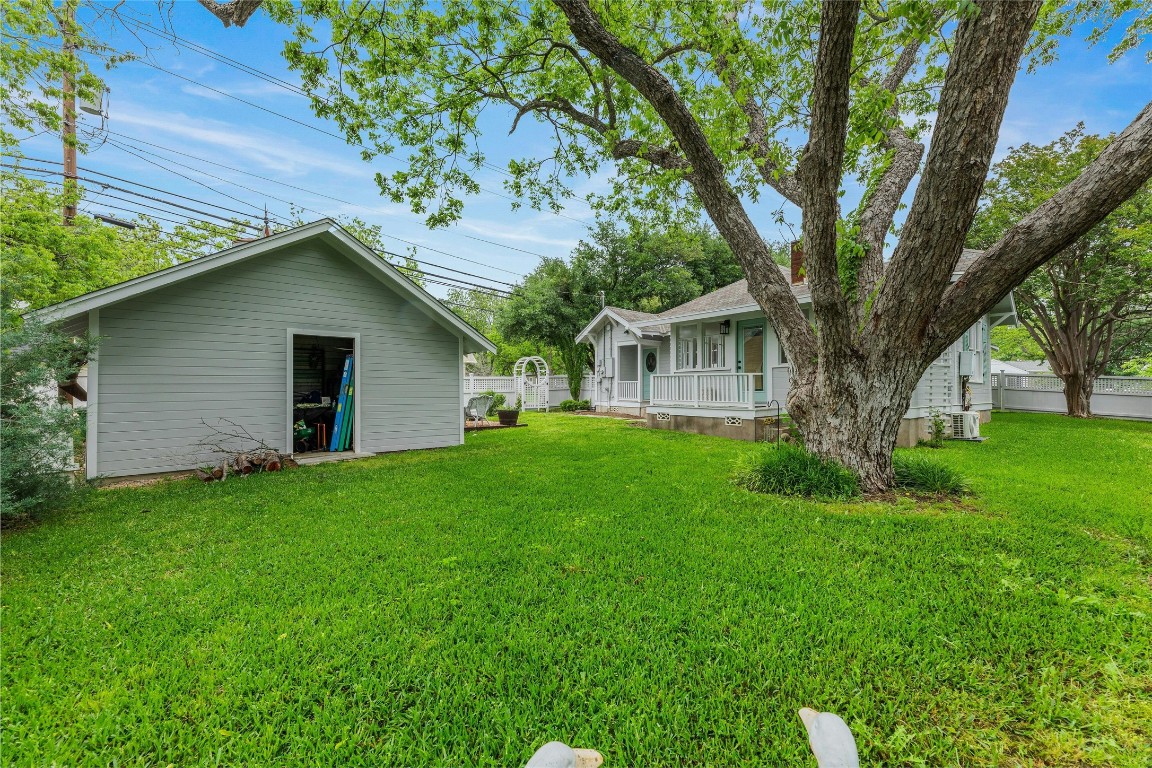 1502 Olive Street Georgetown, TX 78626 - Photo 27 of 38 Backyard facing garage with storage
