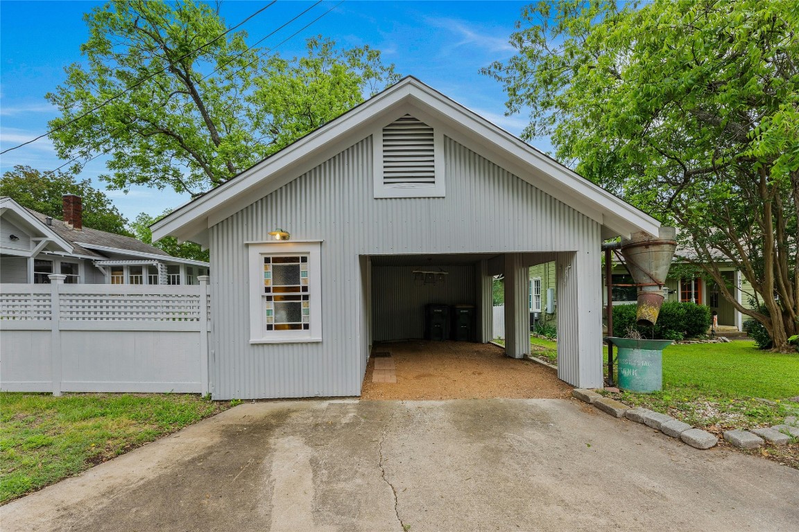 1502 Olive Street Georgetown, TX 78626 - Photo 31 of 38 Darling single car carport with storage