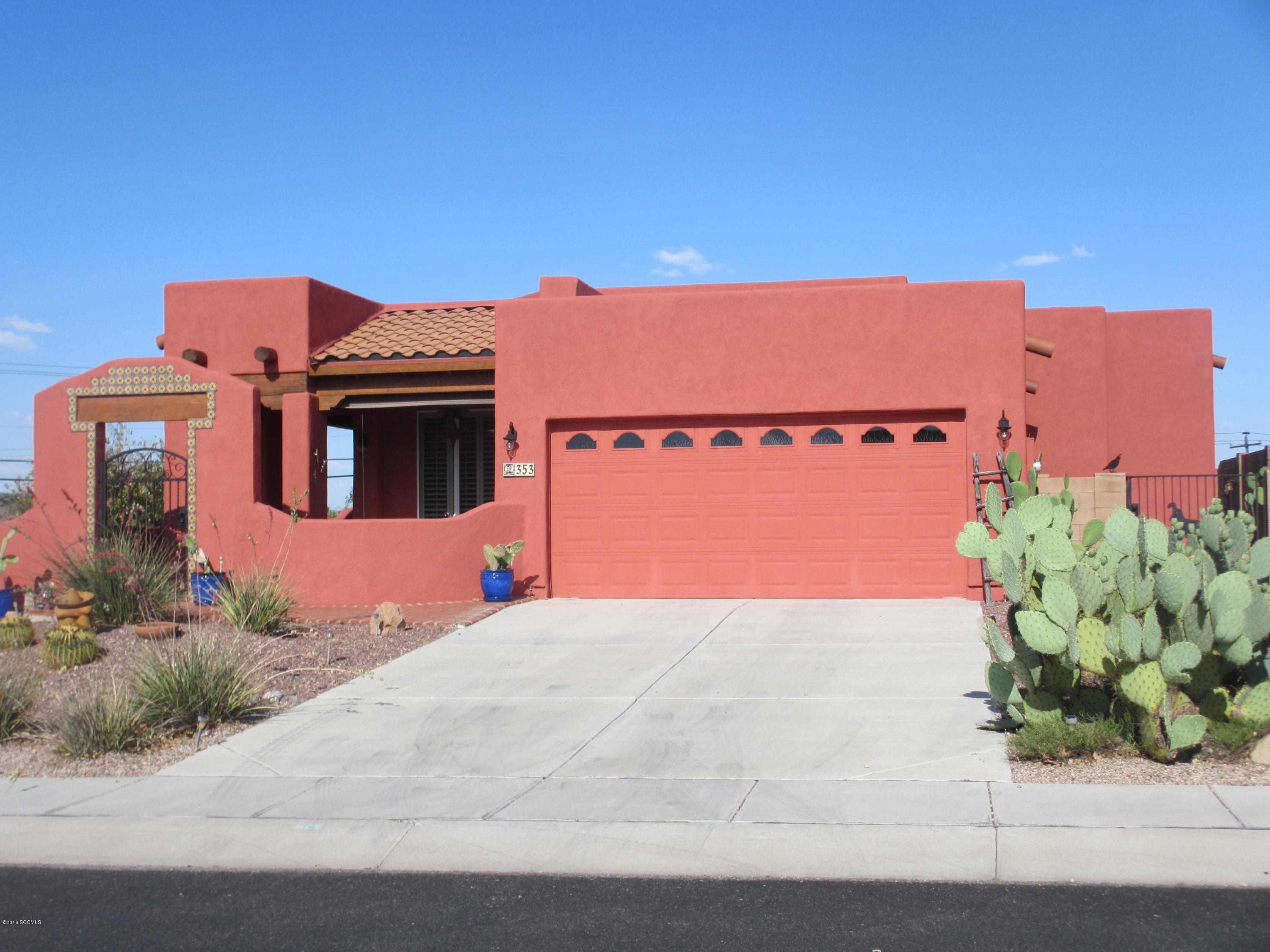 353 Via Bella Donna Rio Rico, AZ 85648 - Photo 1 of 44 a front view of a house with a yard