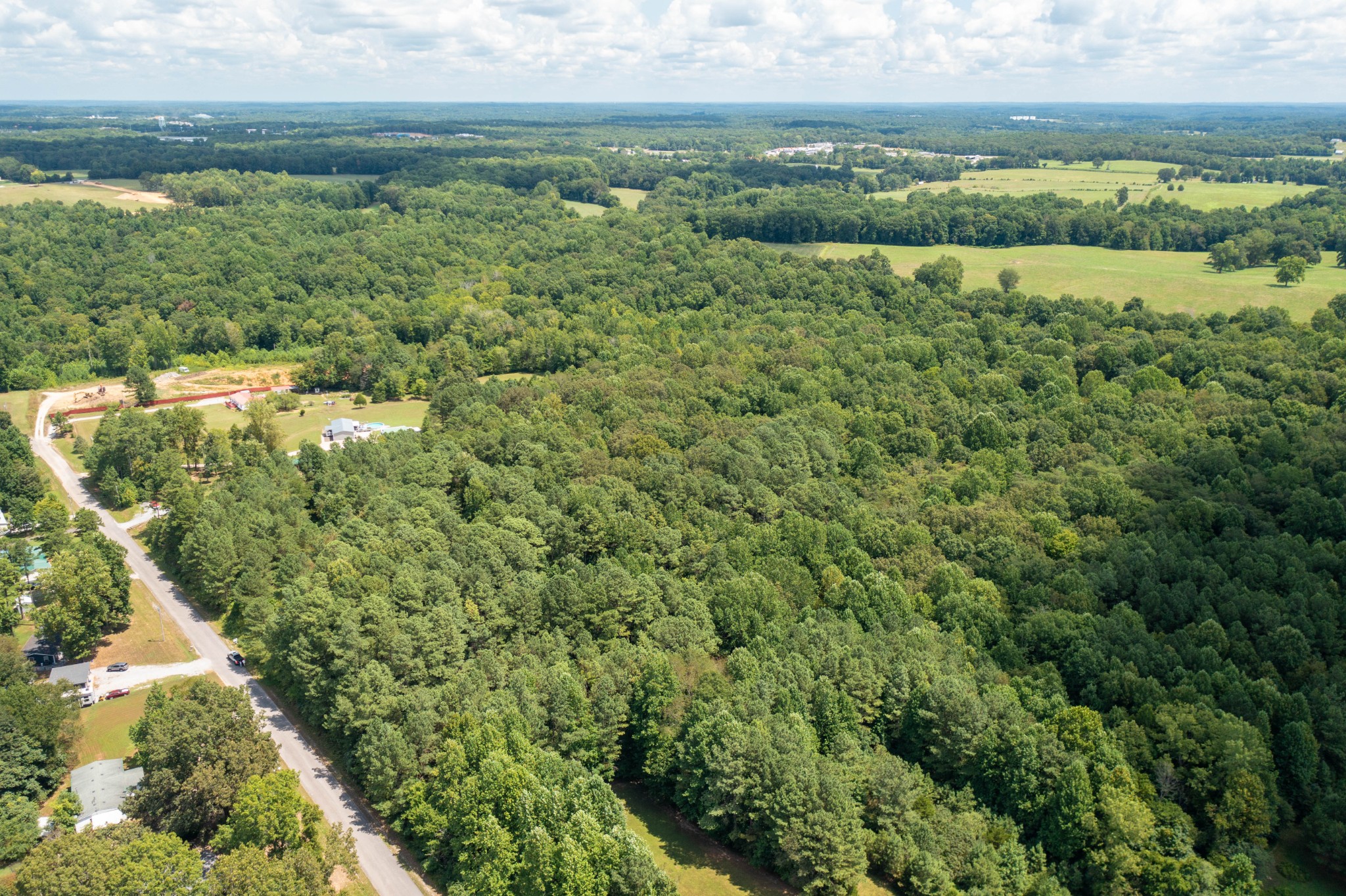 0 South Bear Creek Road Dickson, TN 37055 - Photo 2 of 7 a view of a lake with a city
