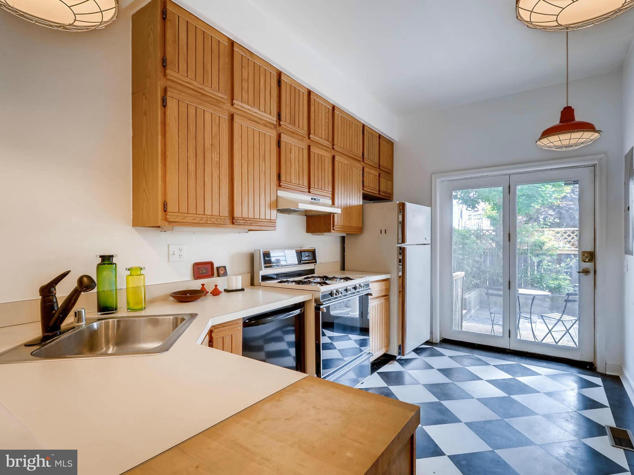 1037 Riverside Avenue Baltimore, MD 21230 - Photo 10 of 30 Kitchen w/ built in cutting board