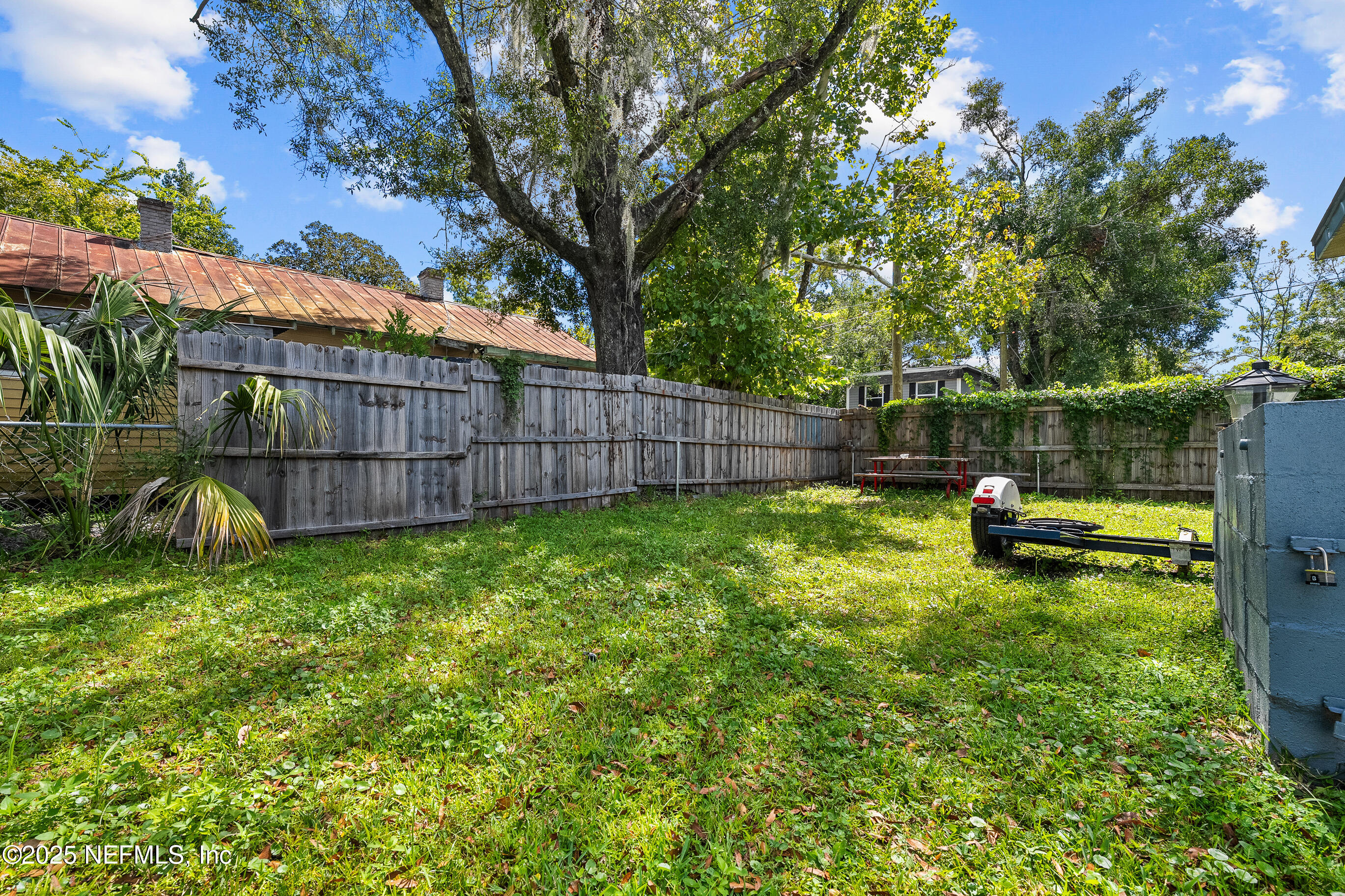 843 Line Street Jacksonville, FL 32209 - Photo 12 of 13 a view of a backyard with a garden and entertaining space