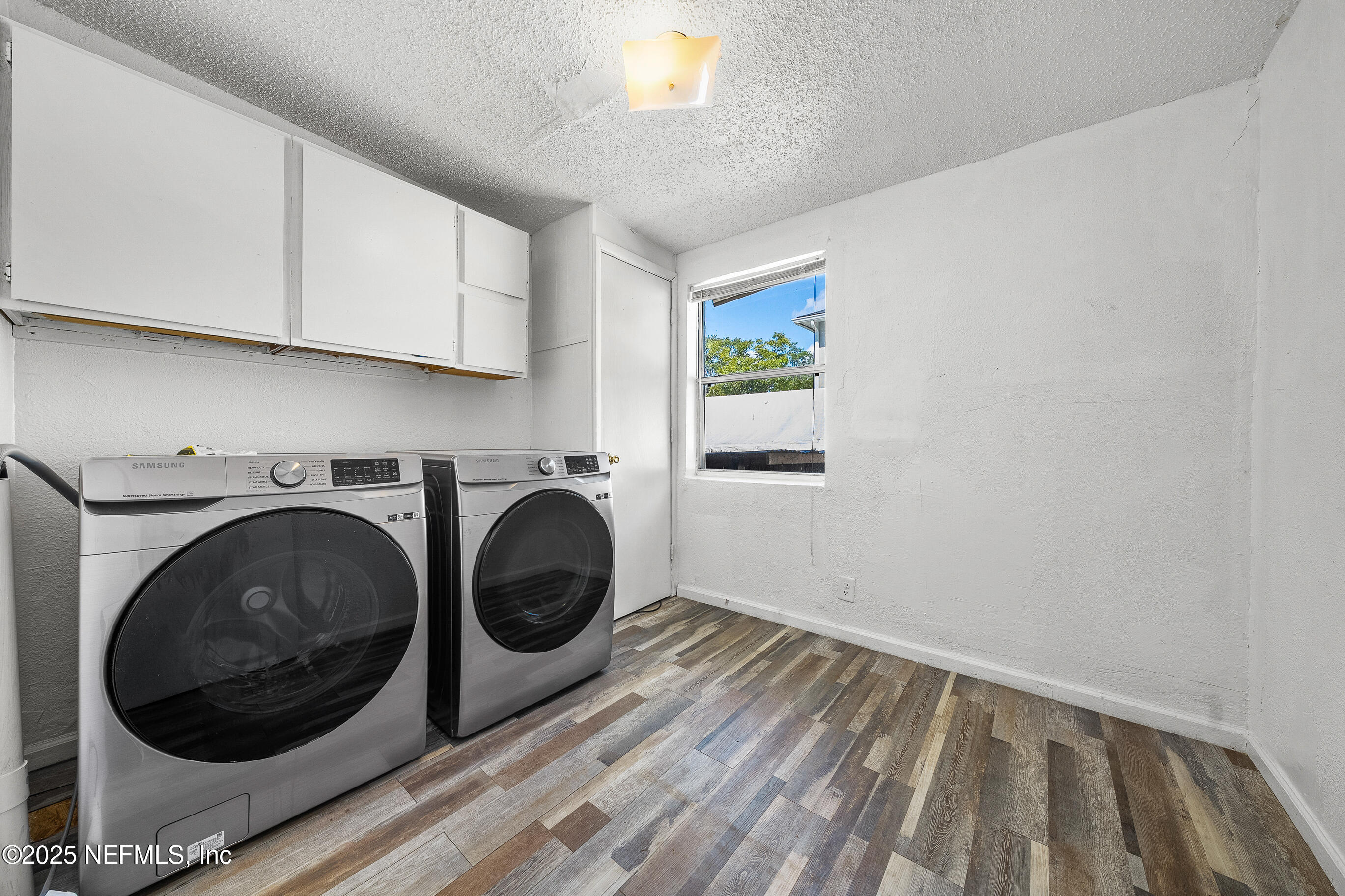 843 Line Street Jacksonville, FL 32209 - Photo 8 of 13 a utility room with sink dryer and washer