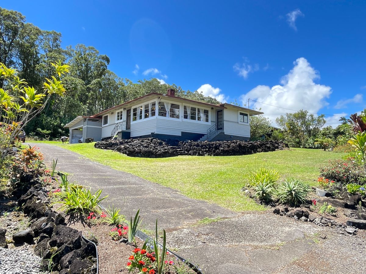 617 Ainako Avenue, Unit 1 Hilo, HI 96720 - Photo 11 of 29 a front view of a house with a yard