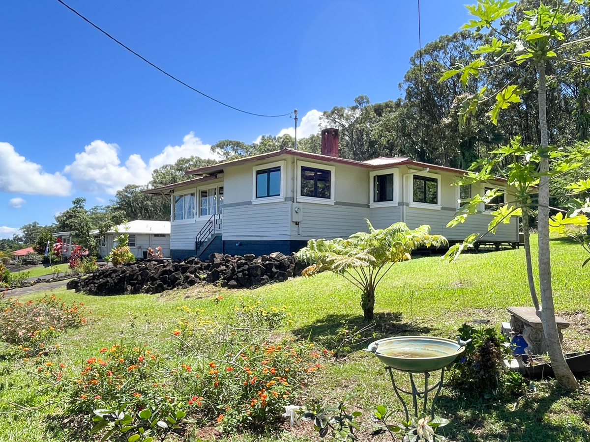 617 Ainako Avenue, Unit 1 Hilo, HI 96720 - Photo 26 of 29 a front view of a house with garden