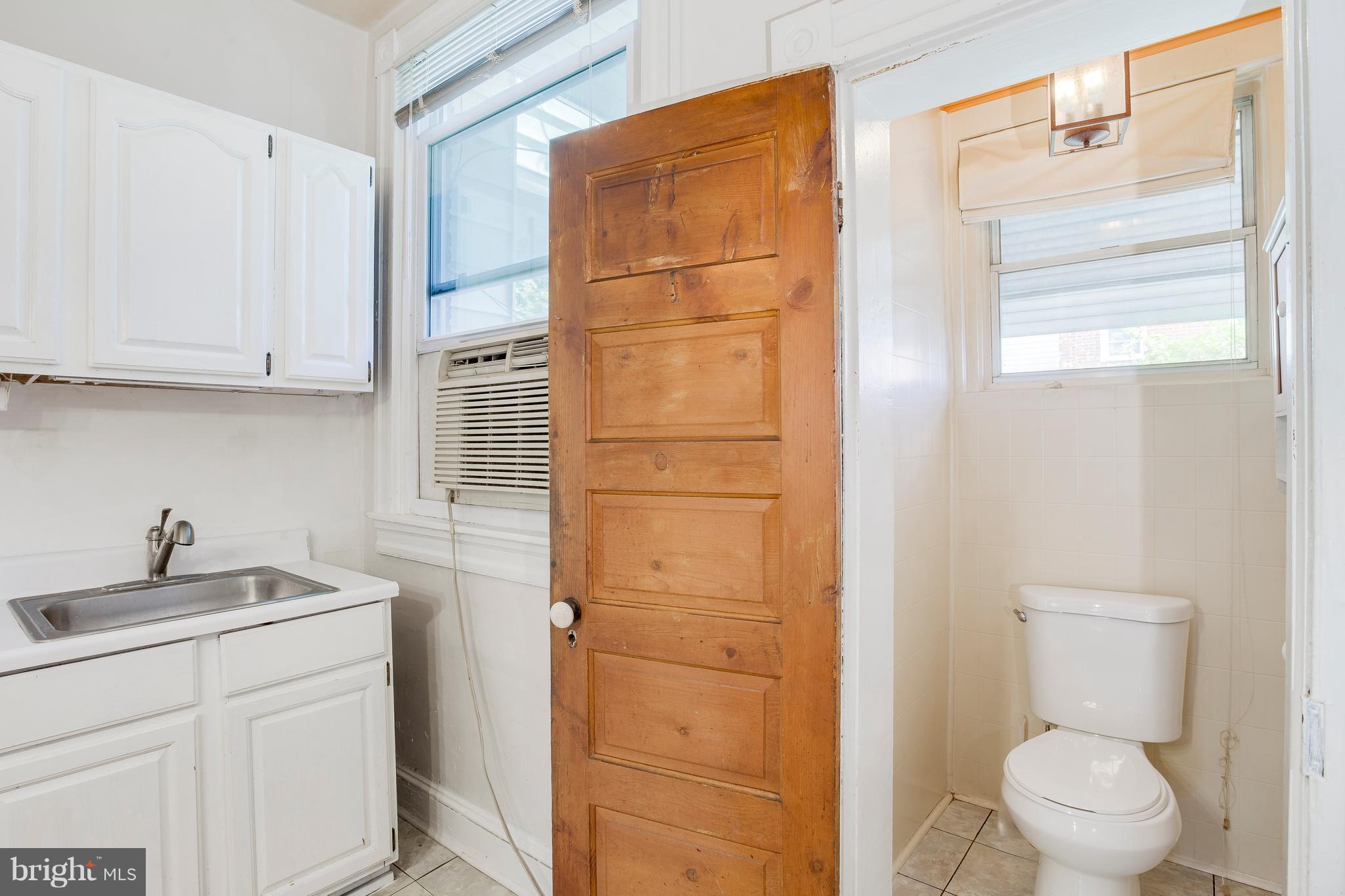 4119 Falls Road Baltimore, MD 21211 - Photo 11 of 23 1st floor powder room in the kitchen