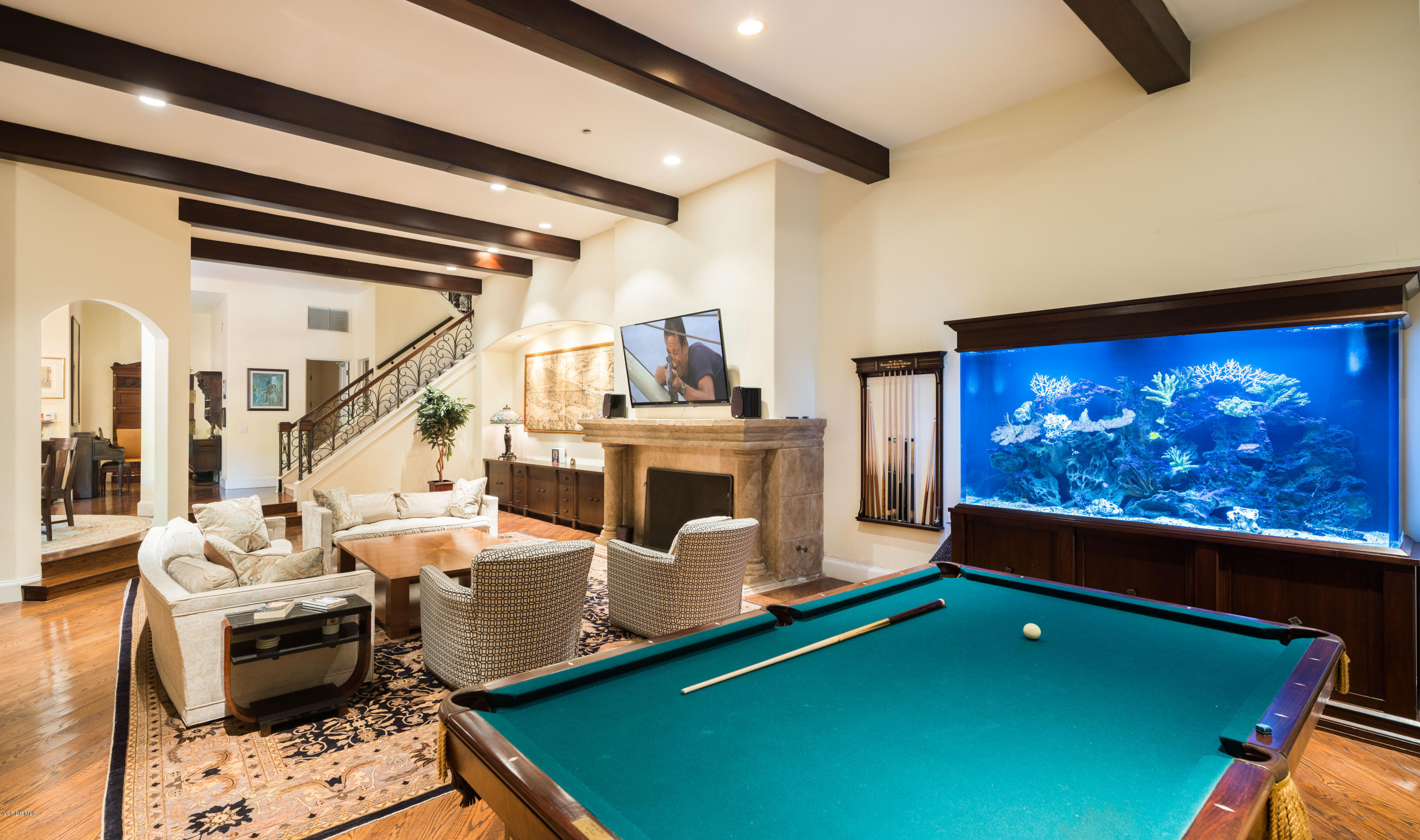 14003 Aubrey Road Beverly Hills, CA 90210 - Photo 22 of 49 a living room with furniture pool table and a flat screen tv