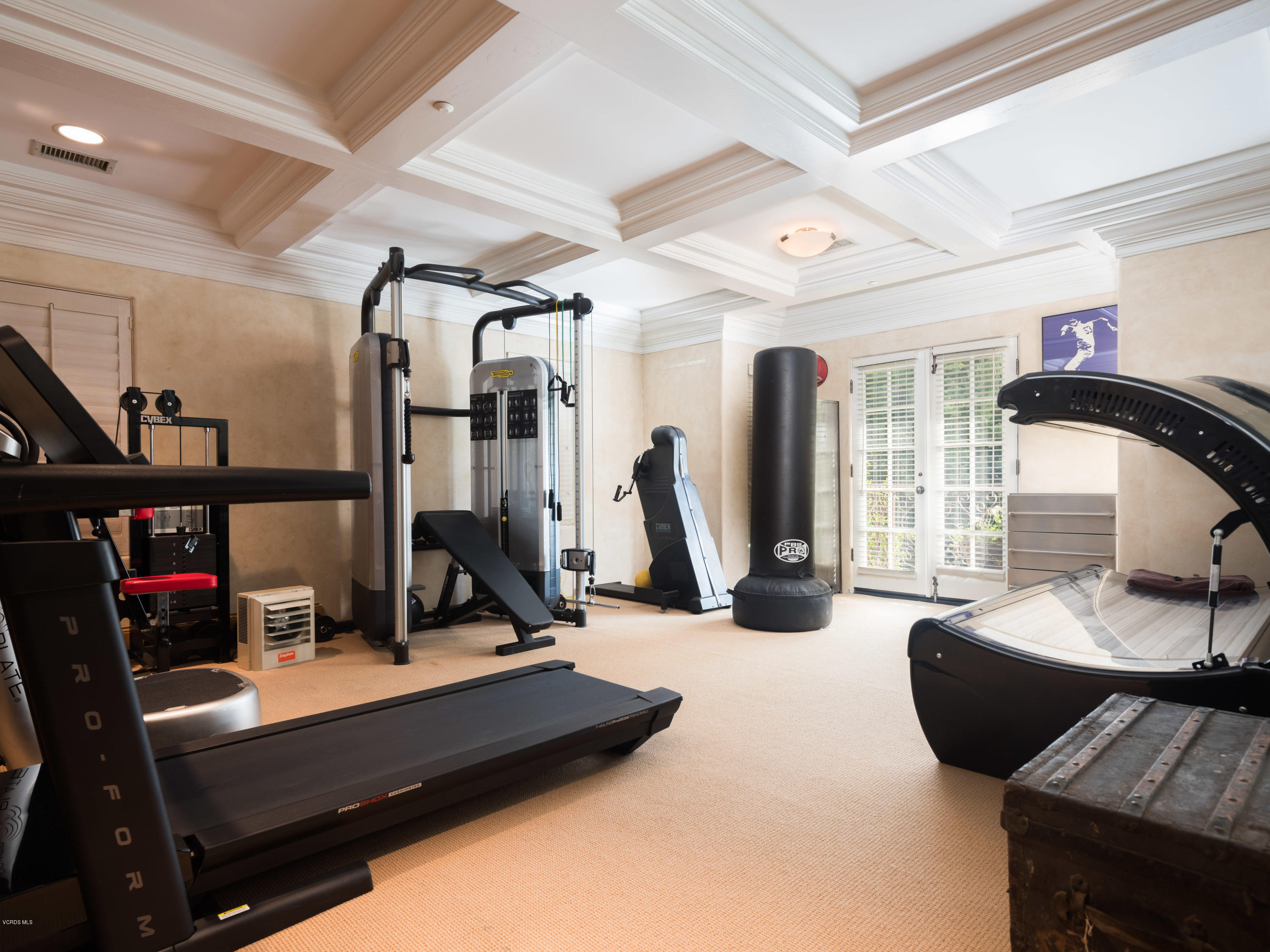 14003 Aubrey Road Beverly Hills, CA 90210 - Photo 28 of 49 a view of a room with gym equipment