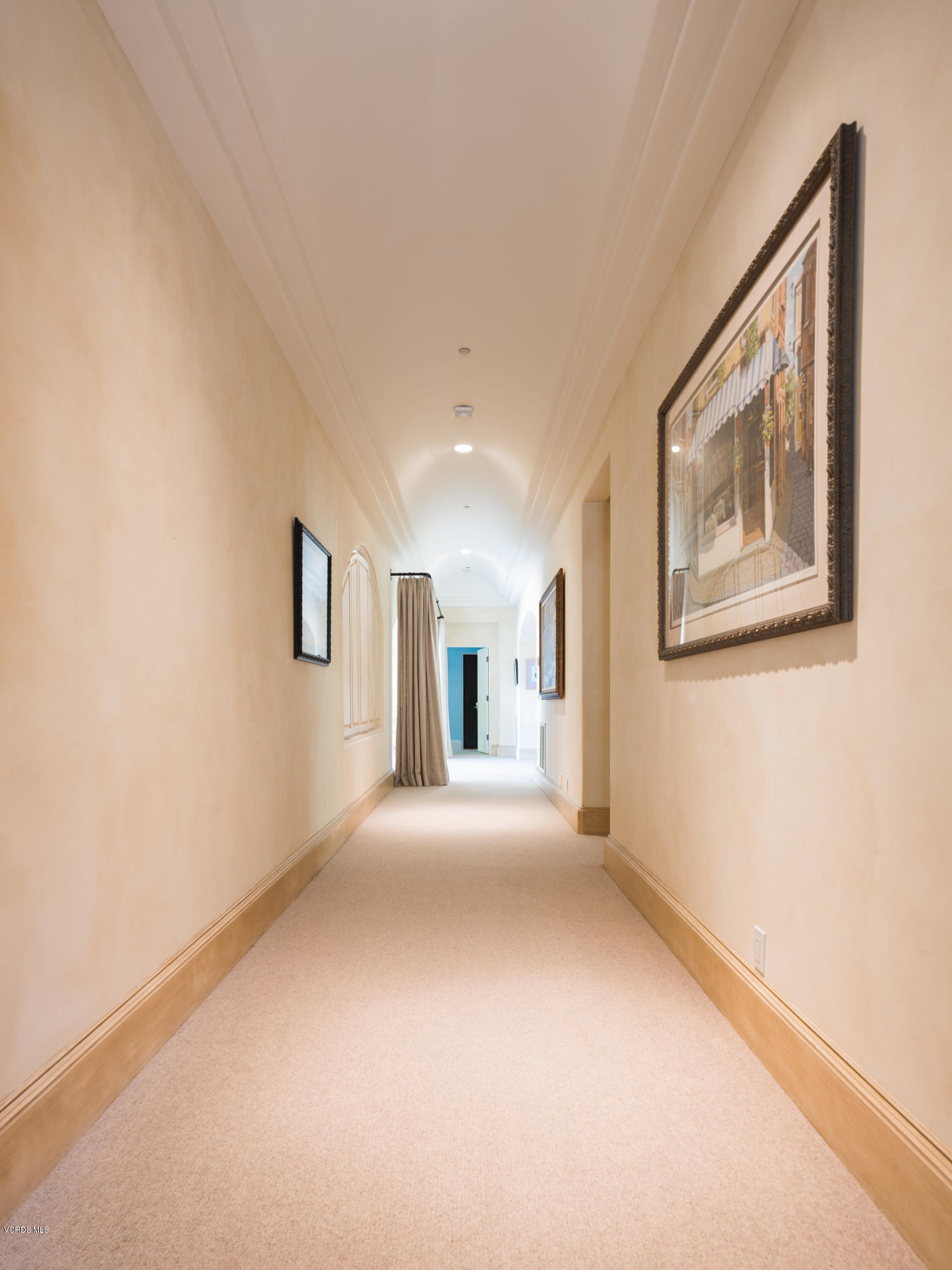 14003 Aubrey Road Beverly Hills, CA 90210 - Photo 31 of 49 a view of a big room with windows and chandelier fan