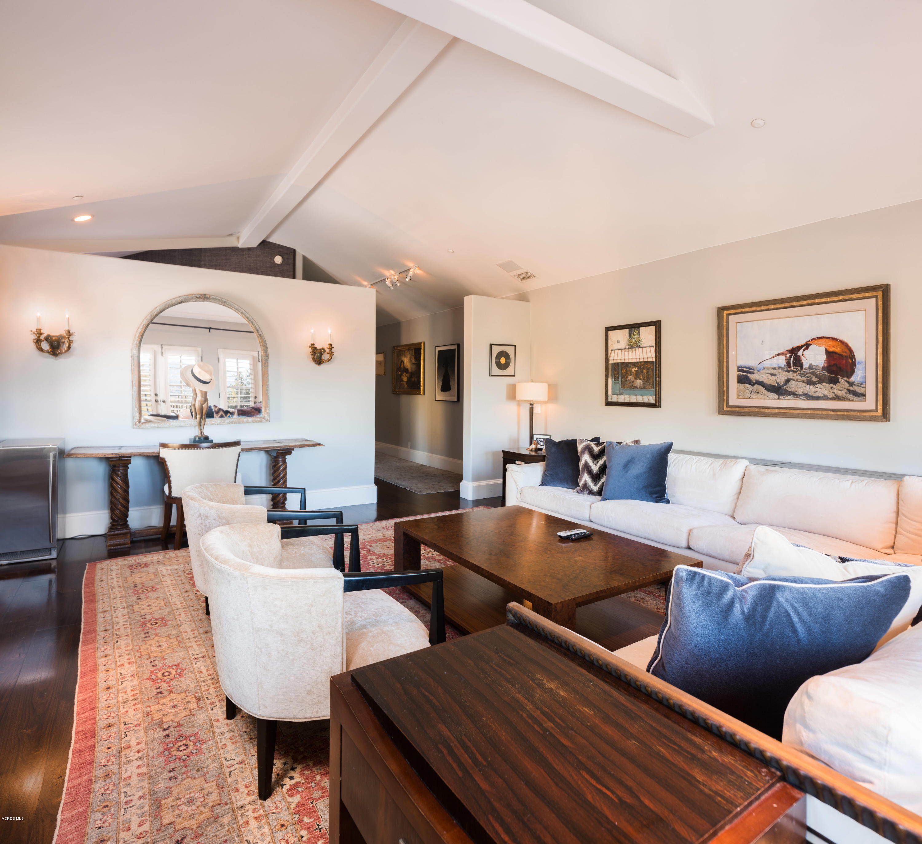 14003 Aubrey Road Beverly Hills, CA 90210 - Photo 33 of 49 a living room with furniture and a mirror