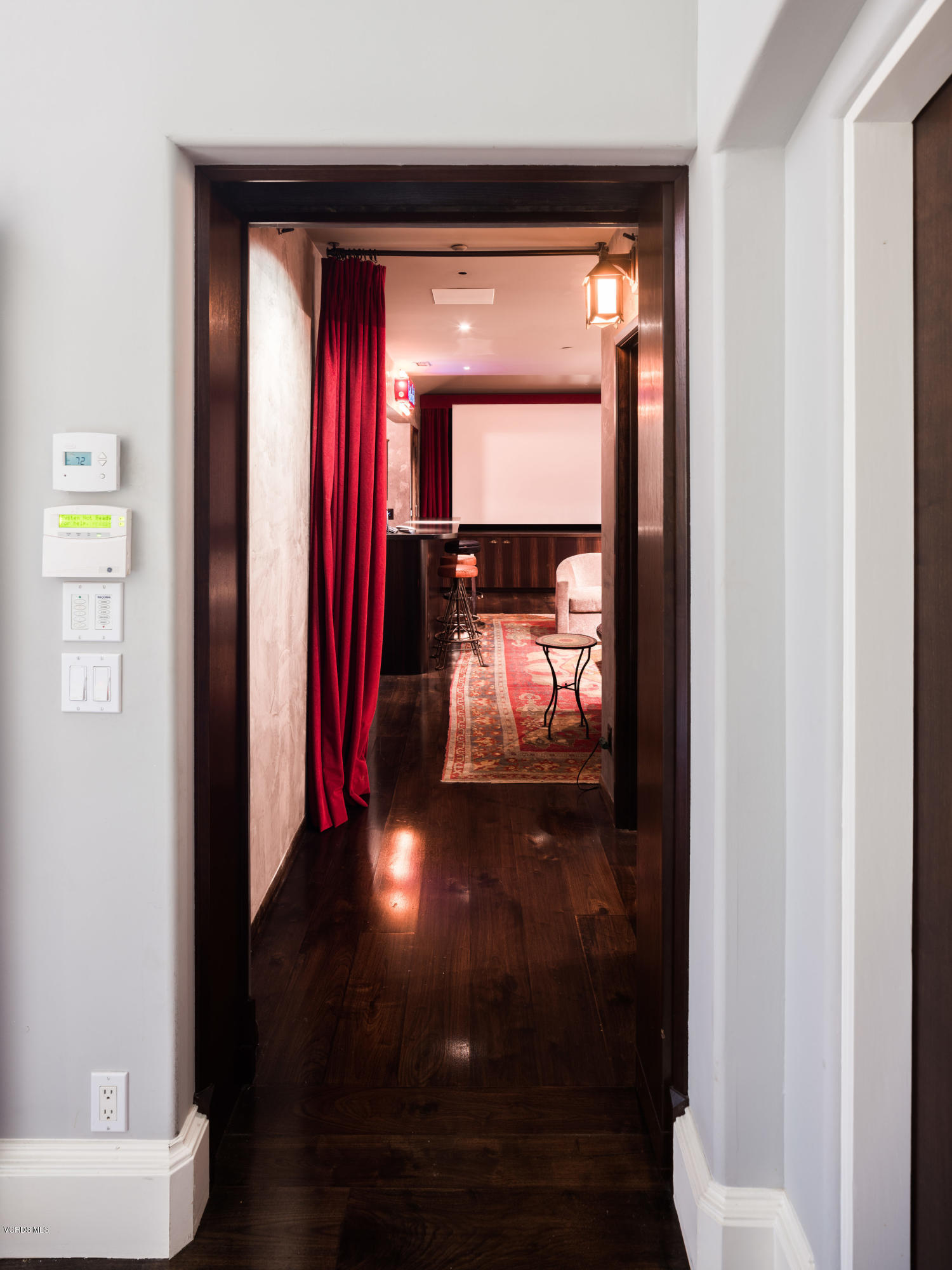 14003 Aubrey Road Beverly Hills, CA 90210 - Photo 36 of 49 a hallway with furniture and a window