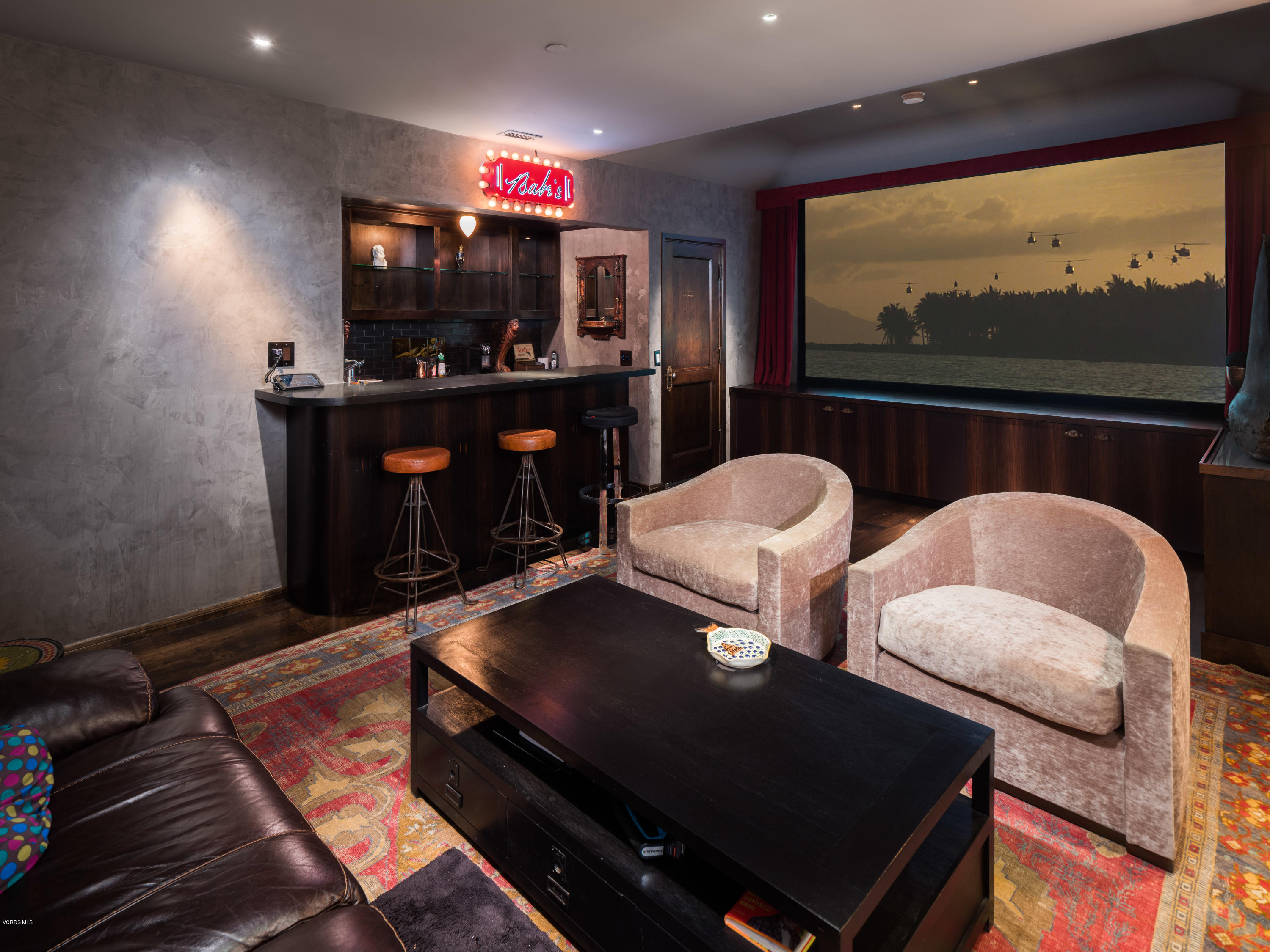 14003 Aubrey Road Beverly Hills, CA 90210 - Photo 38 of 49 a living room with furniture a flat screen tv and a floor to ceiling window