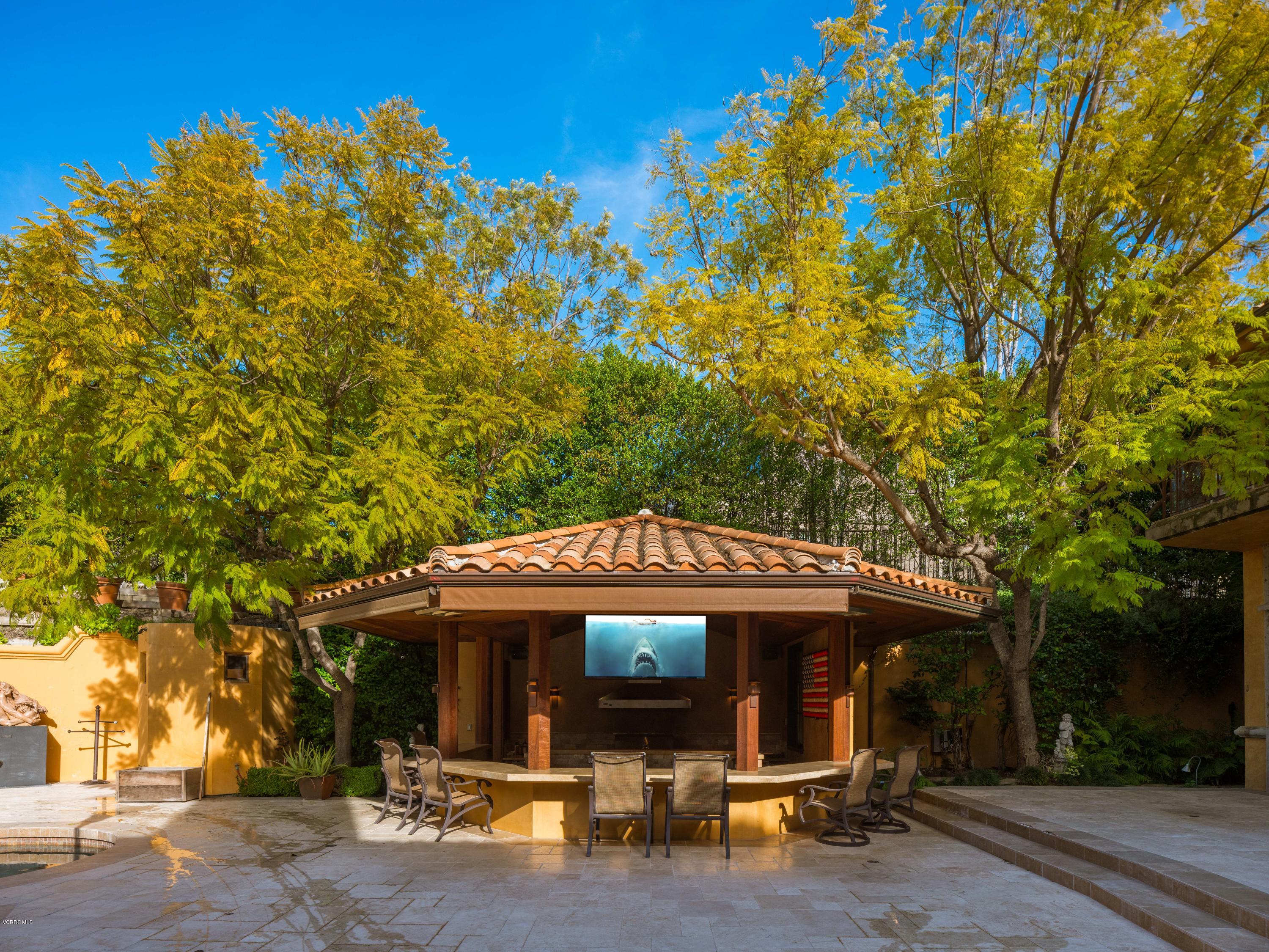 14003 Aubrey Road Beverly Hills, CA 90210 - Photo 6 of 49 a front view of a house with porch