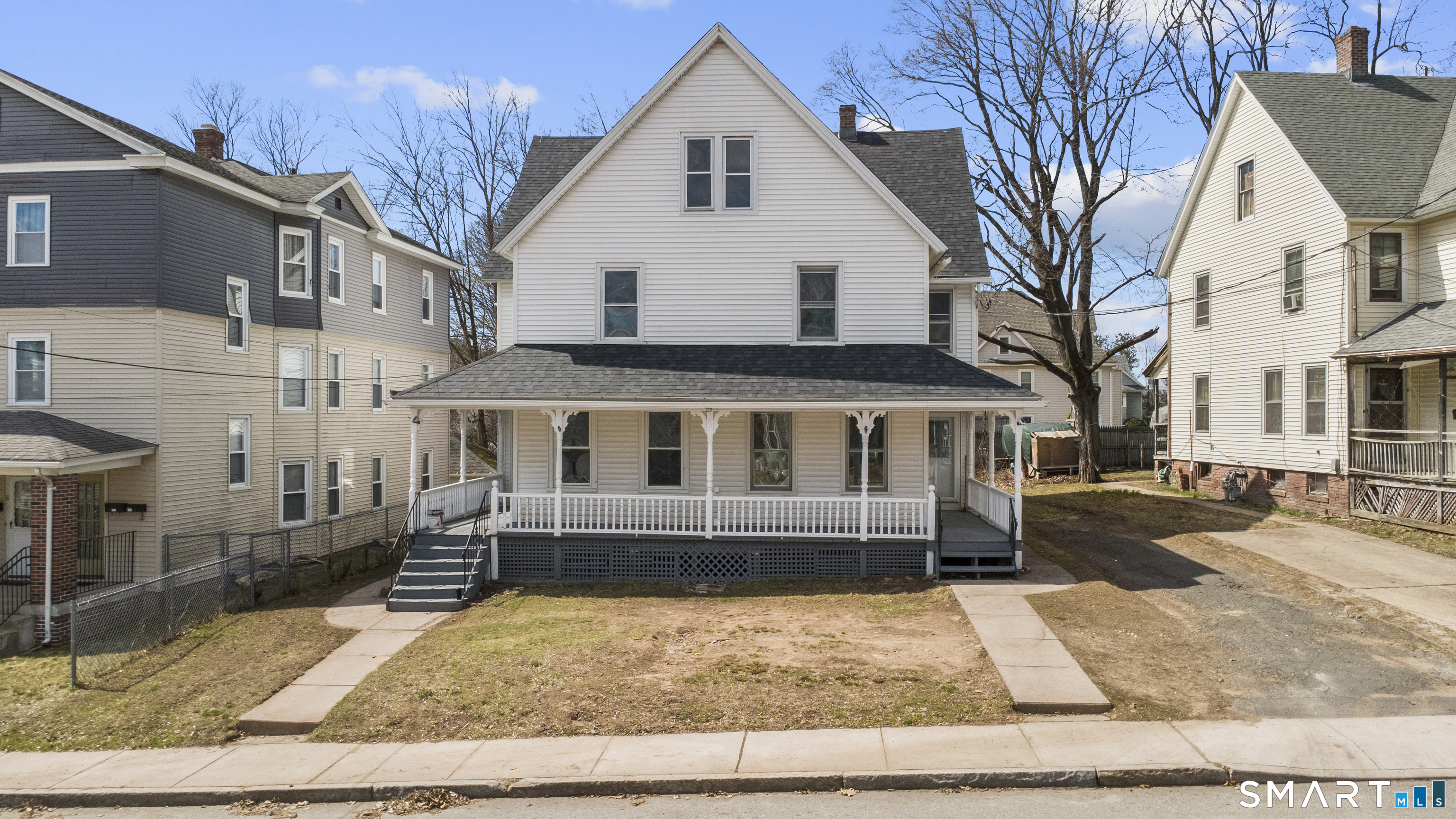 12 Newman Street Manchester, CT 06040 - Photo 1 of 1 a front view of a house with a yard