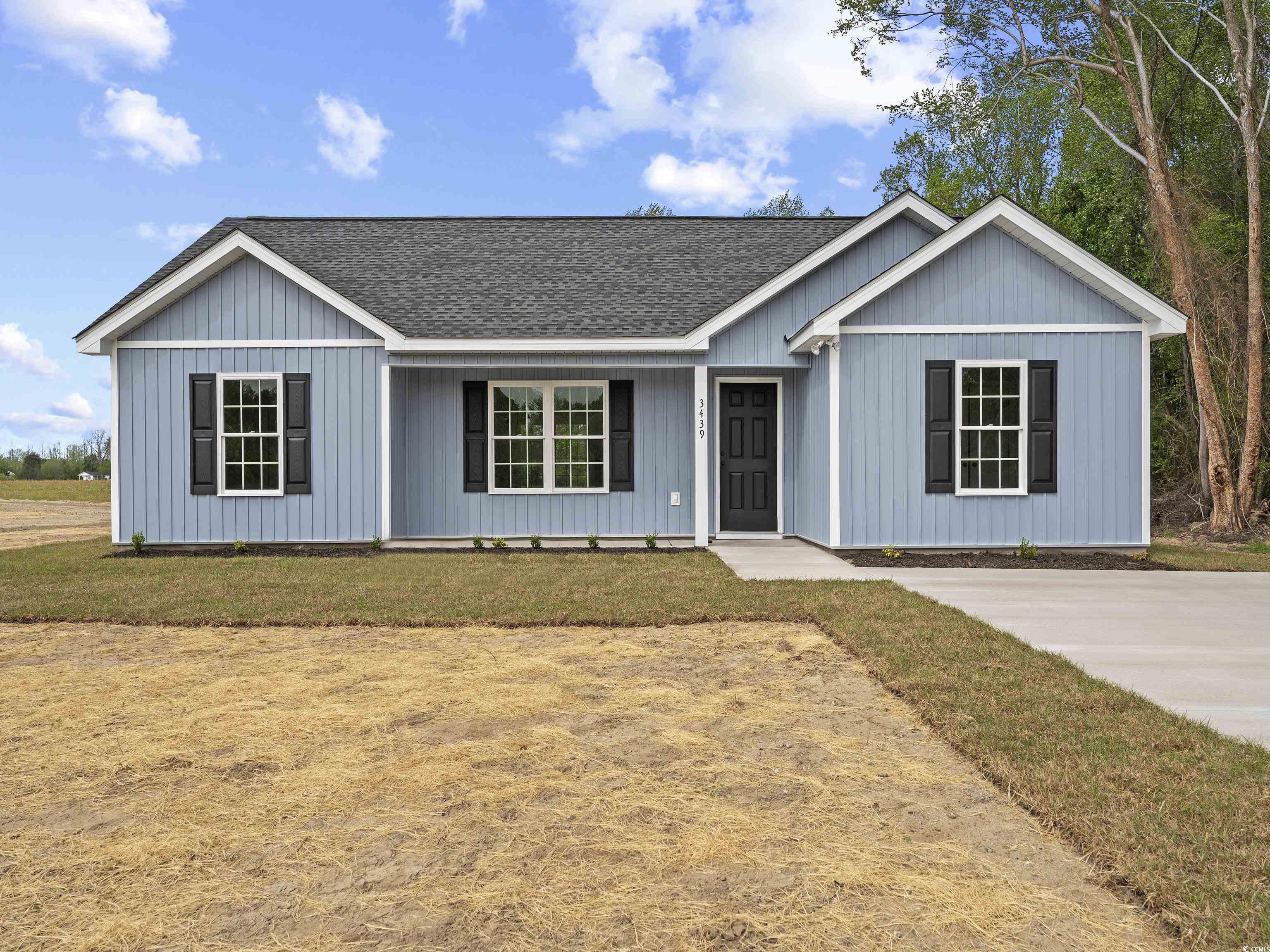 849 Highway 67 Loris Sc 29569 Loris, SC 29569 - Photo 7 of 28 View of front of house featuring a shingled roof and a front yard