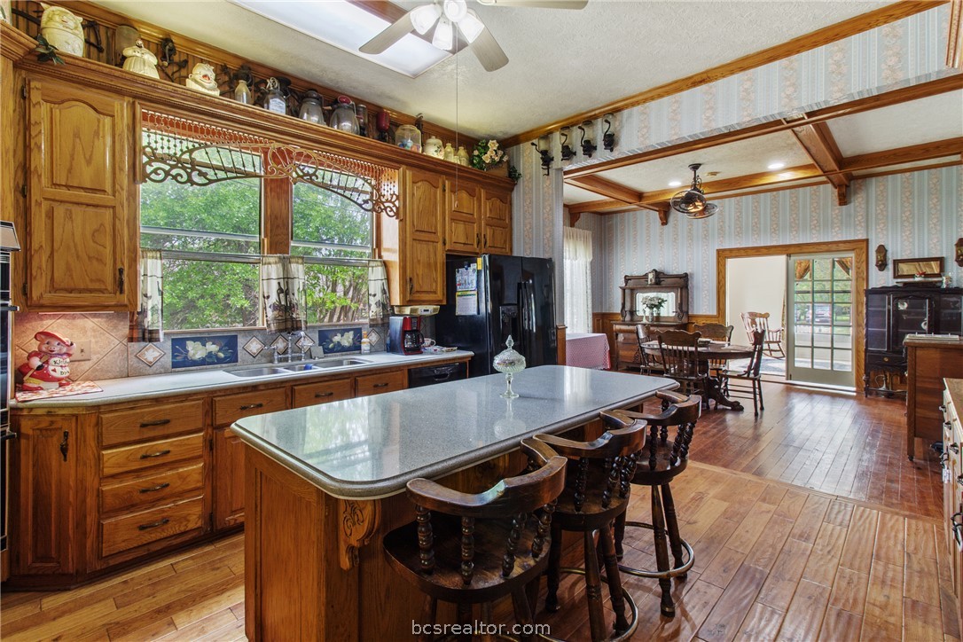 106 South Logan Avenue Bryan, TX 77803 - Photo 23 of 47 a view of a dining room with furniture window and wooden floor