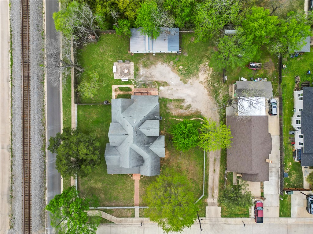 106 South Logan Avenue Bryan, TX 77803 - Photo 46 of 47 an aerial view of a house with yard swimming pool and outdoor seating