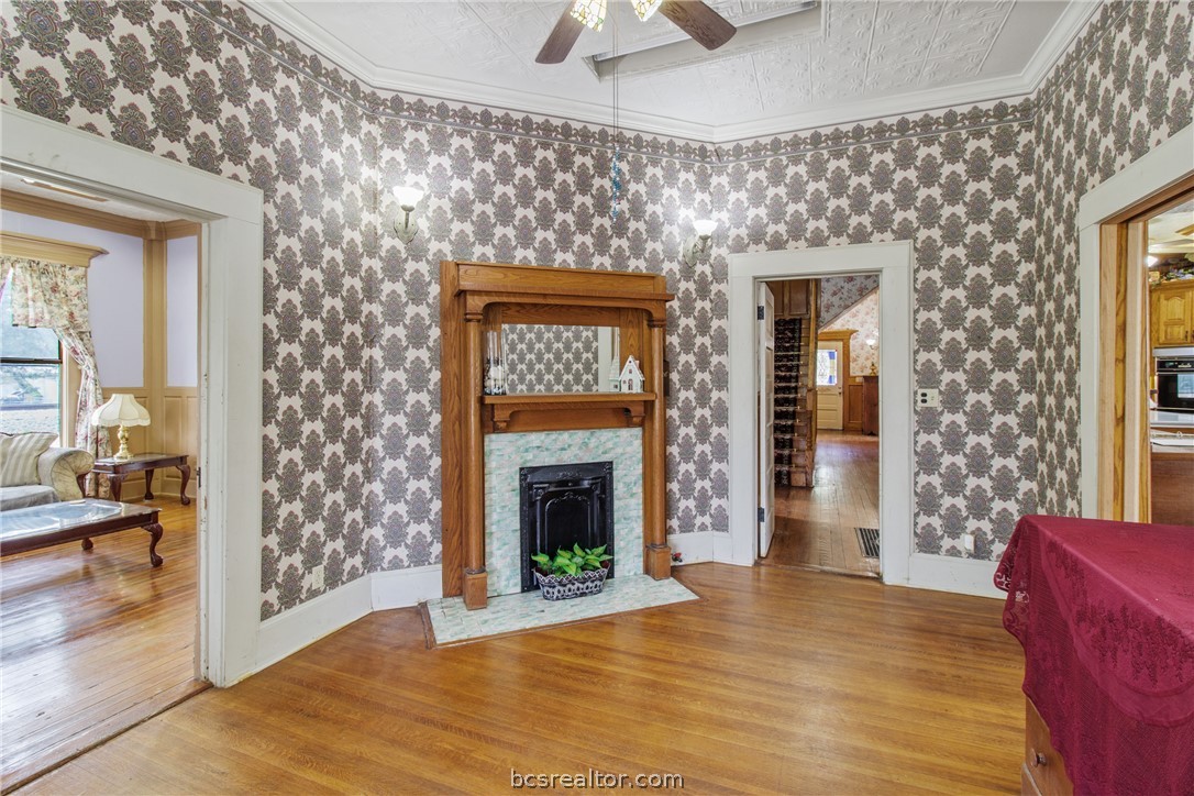 106 South Logan Avenue Bryan, TX 77803 - Photo 7 of 47 a view of an entryway with a fireplace