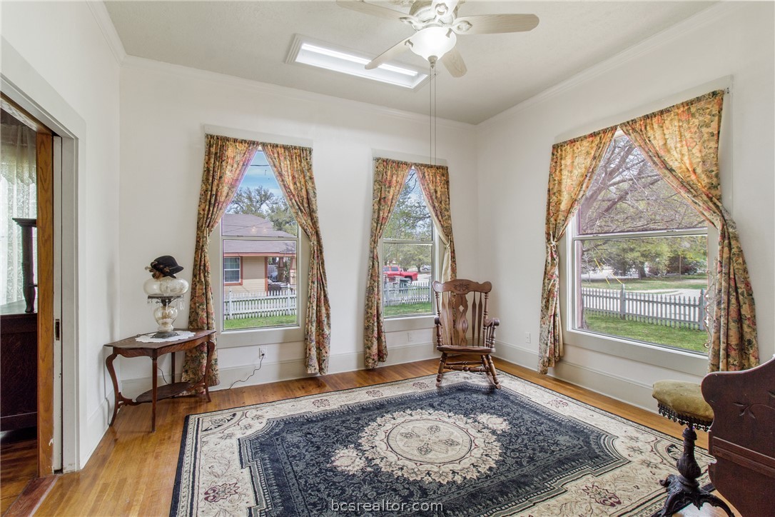 106 South Logan Avenue Bryan, TX 77803 - Photo 8 of 47 a living room with furniture and a fireplace
