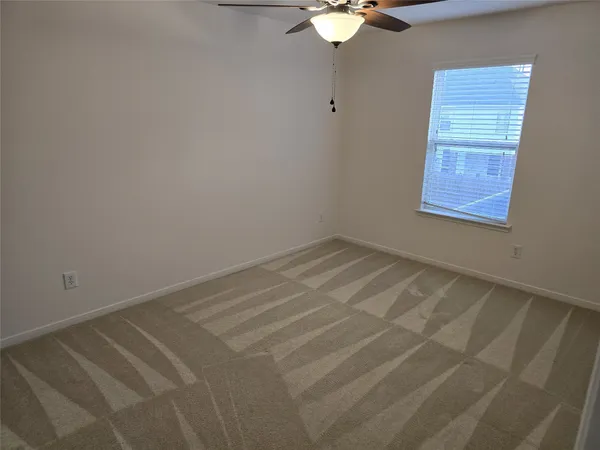 a view of a room with a window