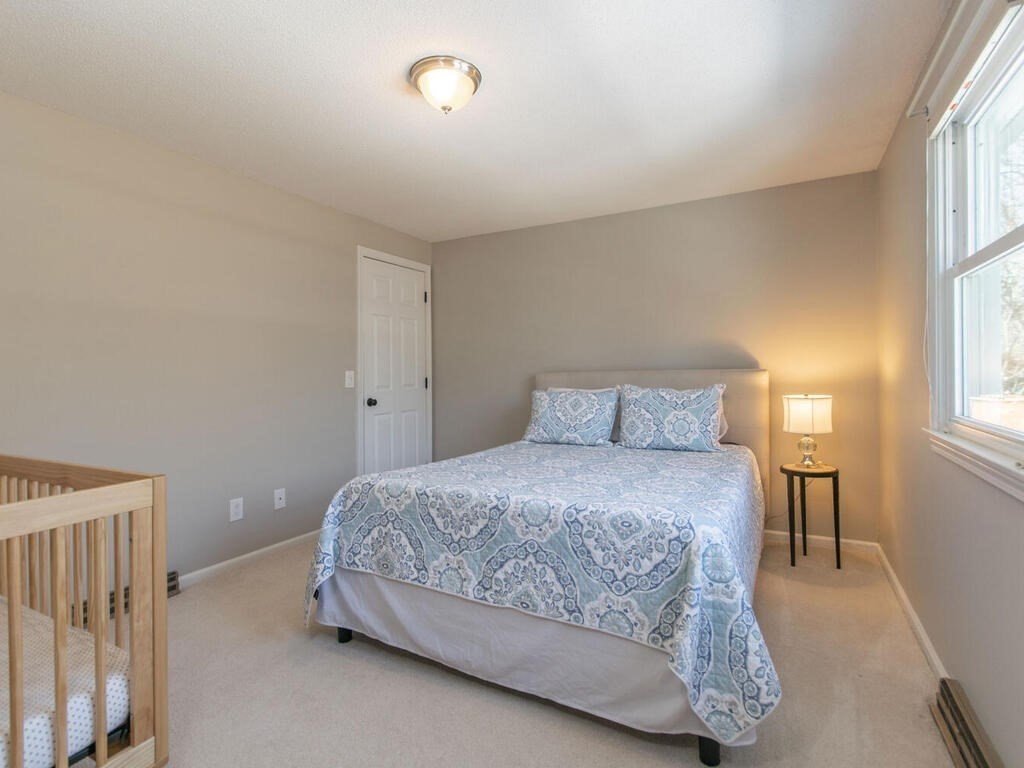 19 Quinnehtuk Road Longmeadow, MA 01106 - Photo 29 of 42 a bedroom with a bed and window