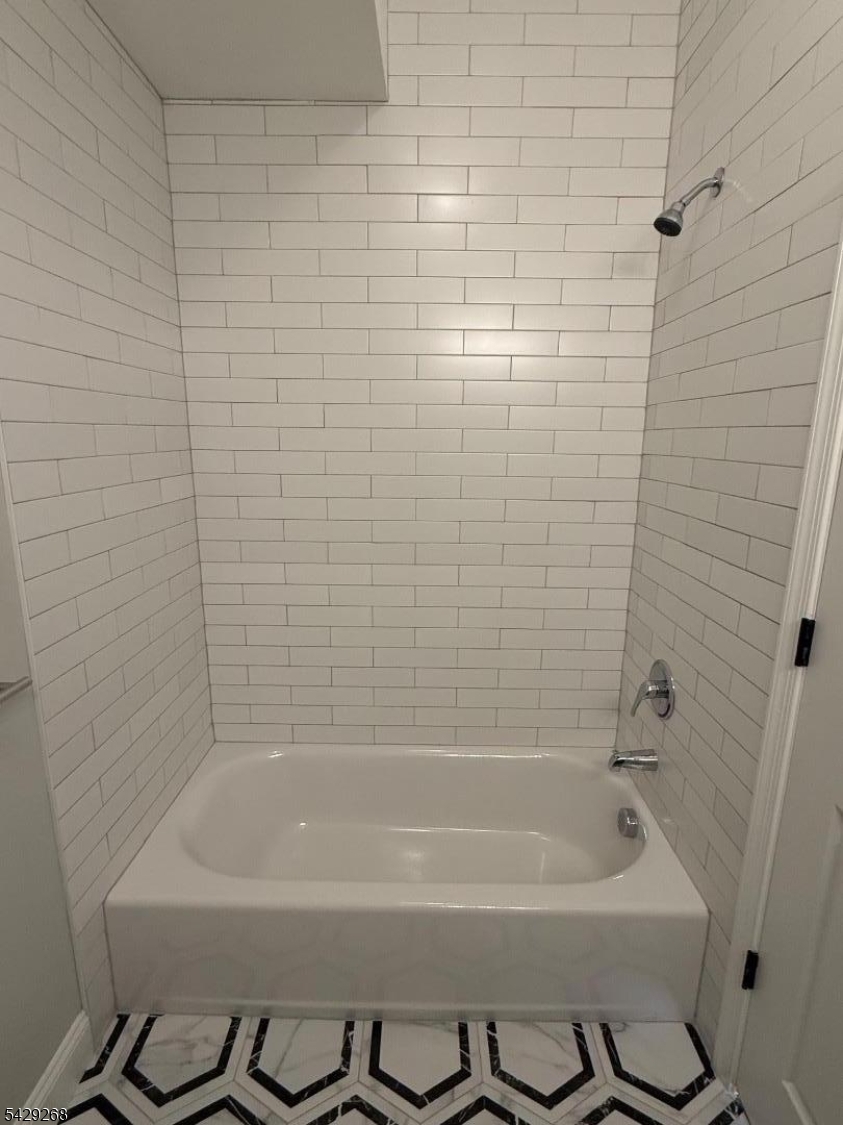 223 South 11th Street, Unit 2 Newark, NJ 07107 - Photo 15 of 15 a bathroom with a bathtub