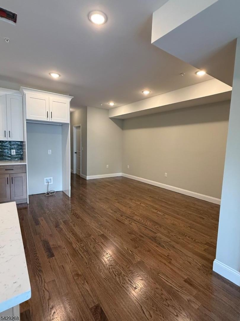 223 South 11th Street, Unit 2 Newark, NJ 07107 - Photo 4 of 15 a view of kitchen and utility room