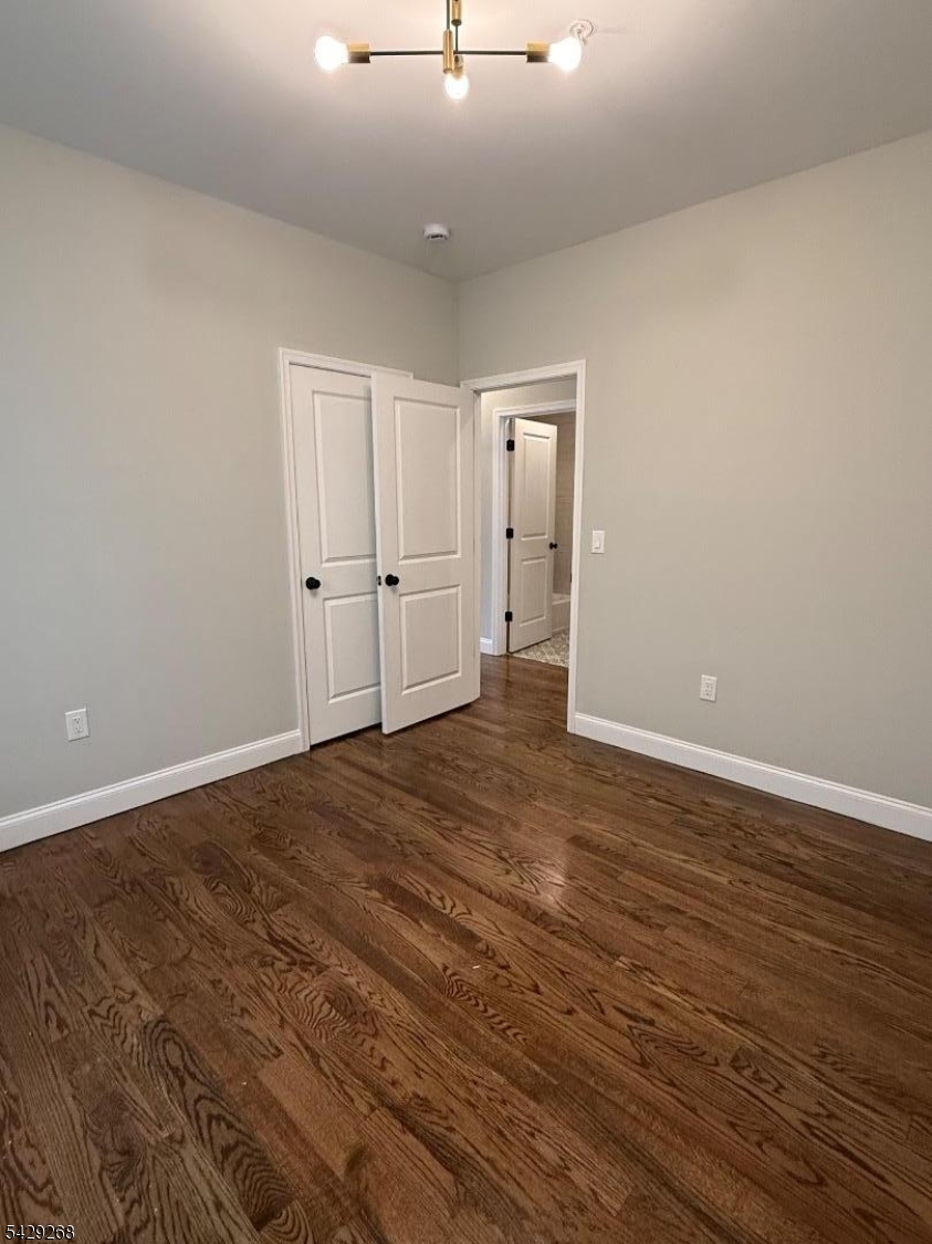 223 South 11th Street, Unit 2 Newark, NJ 07107 - Photo 7 of 15 a view of a livingroom with wooden floor