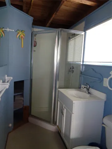 a bathroom with a sink and mirror