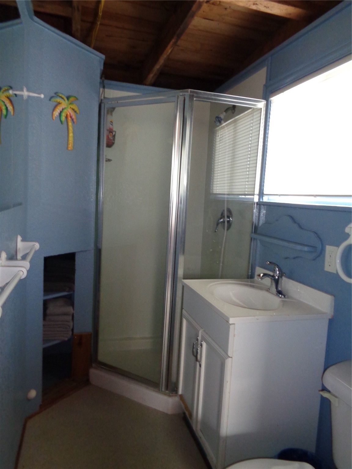 414 Caisson Street Surfside Beach, TX 77541 - Photo 7 of 8 a bathroom with a sink and mirror