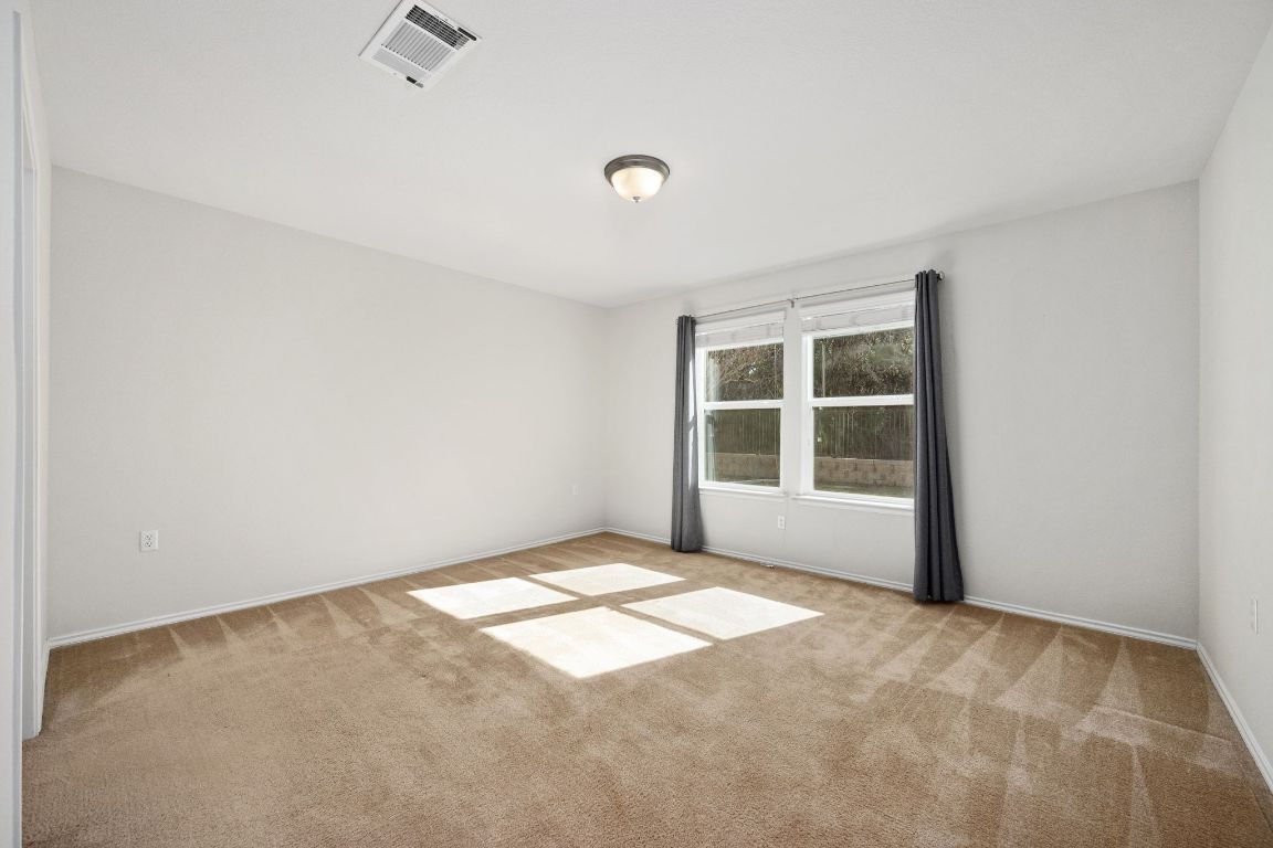 225 Hobby Street Georgetown, TX 78633 - Photo 15 of 40 an empty room with windows