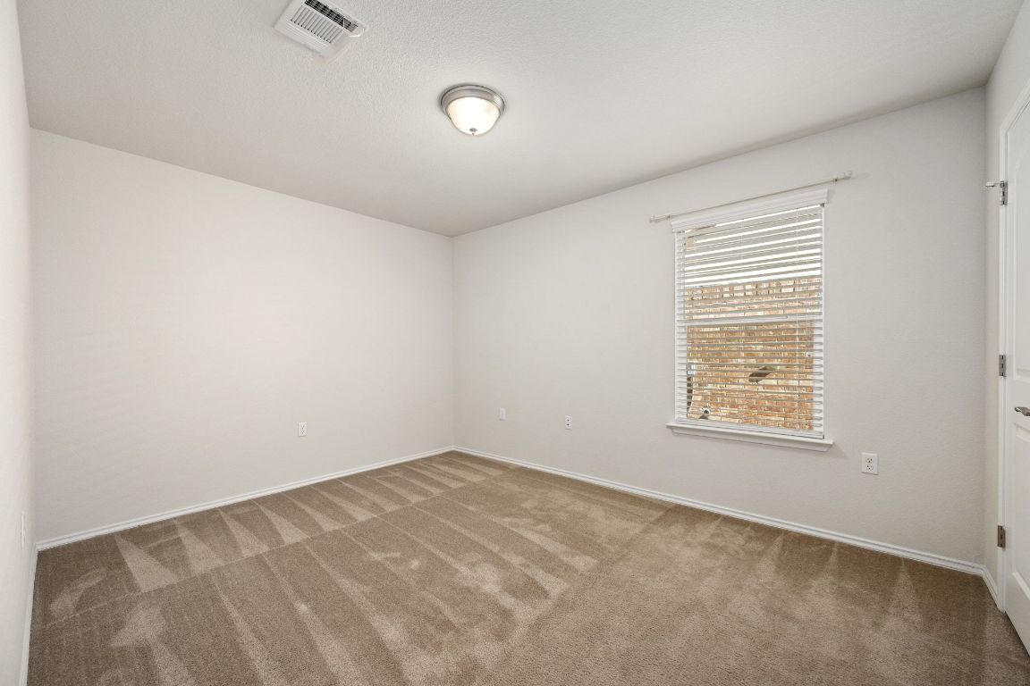 225 Hobby Street Georgetown, TX 78633 - Photo 19 of 40 an empty room with a window