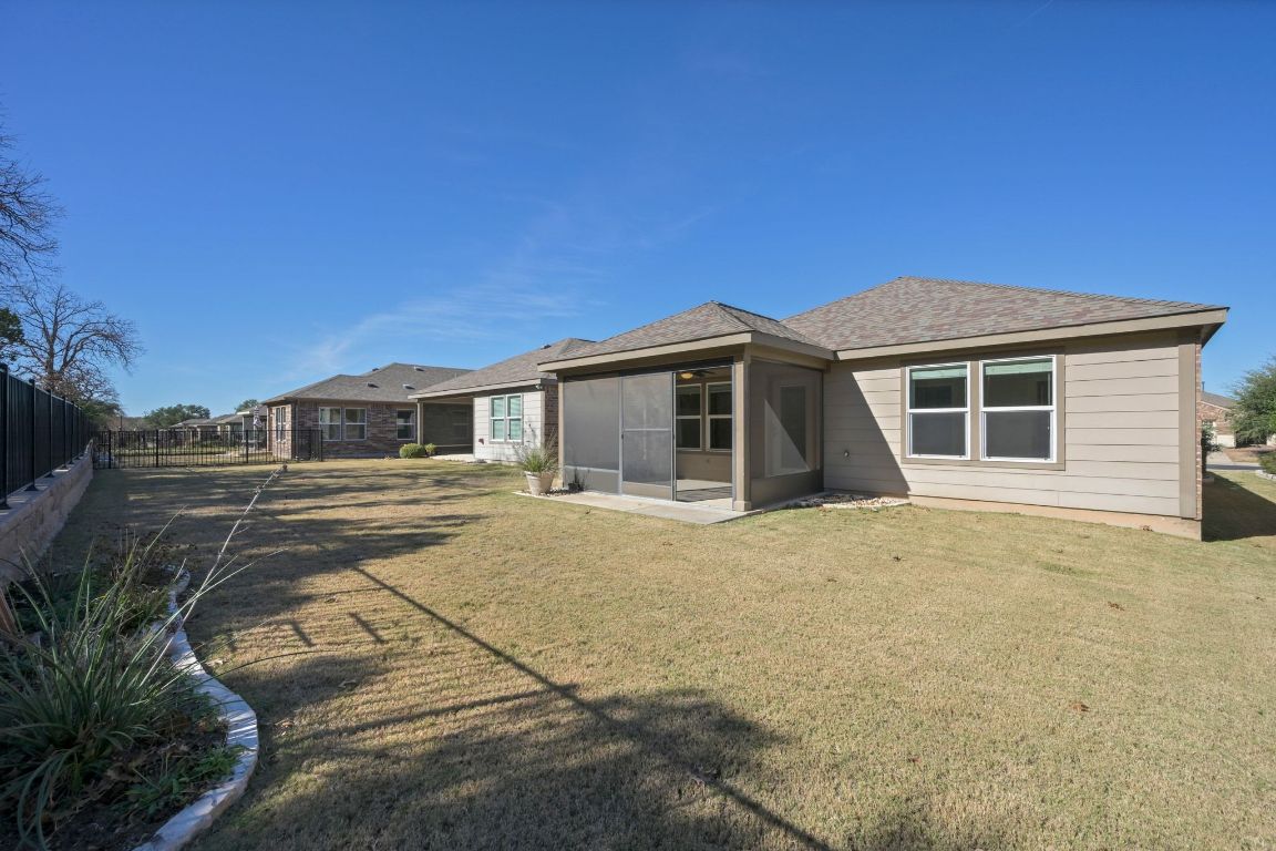 225 Hobby Street Georgetown, TX 78633 - Photo 26 of 40 a front view of a house with a yard