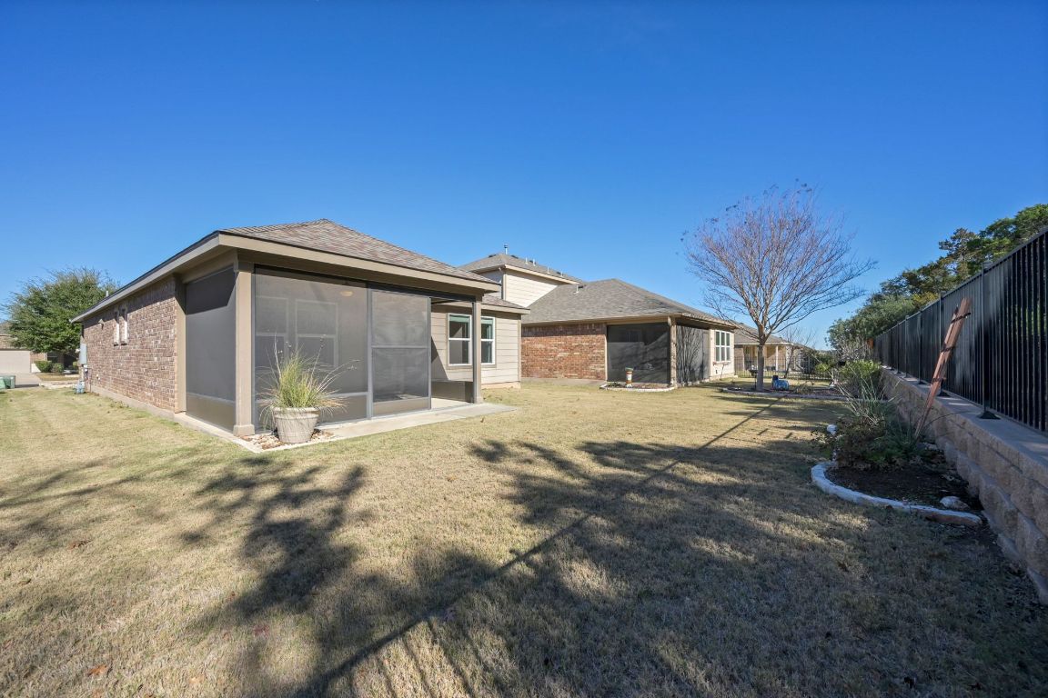 225 Hobby Street Georgetown, TX 78633 - Photo 27 of 40 a view of a house with a yard