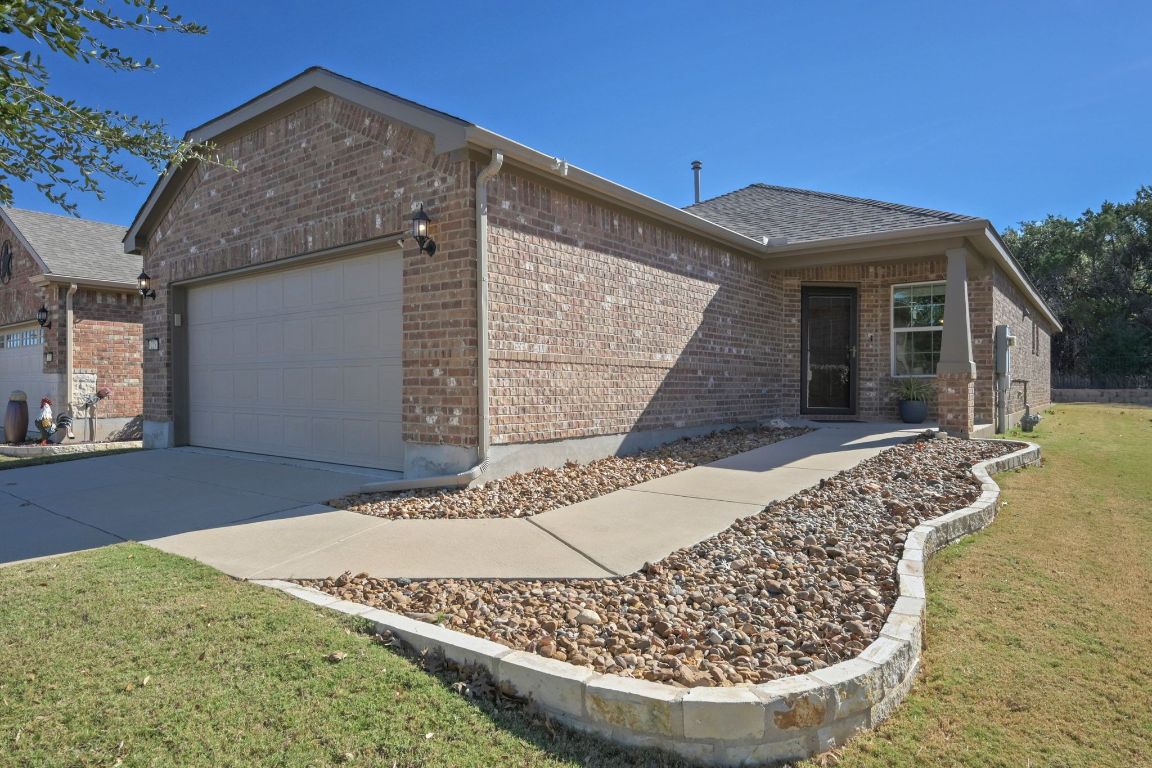 225 Hobby Street Georgetown, TX 78633 - Photo 3 of 40 a view of a house with a patio
