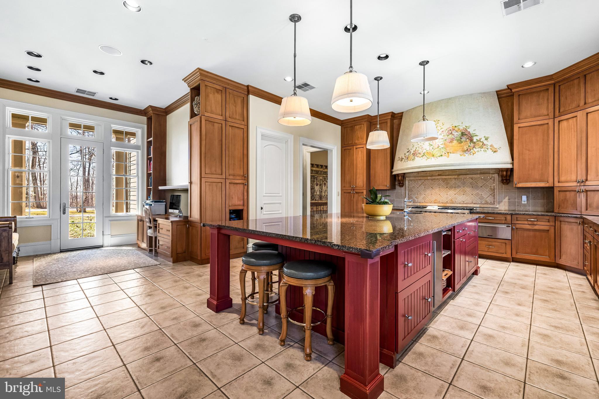 11300 John Carroll Road Owings Mills, MD 21117 - Photo 22 of 102 a large kitchen with stainless steel appliances granite countertop a stove a sink and a refrigerator