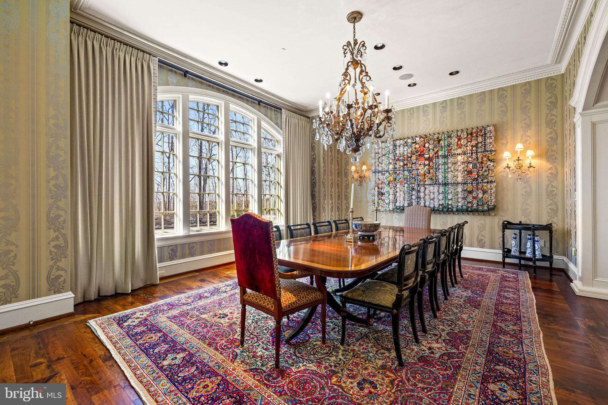 11300 John Carroll Road Owings Mills, MD 21117 - Photo 32 of 102 a view of a dining room with furniture and wooden floor