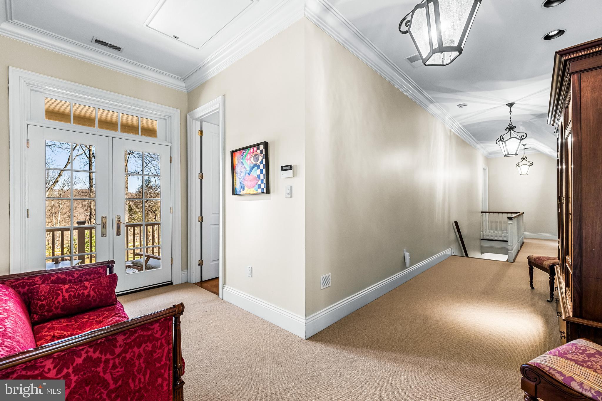 11300 John Carroll Road Owings Mills, MD 21117 - Photo 45 of 102 a living room with furniture and a chandelier
