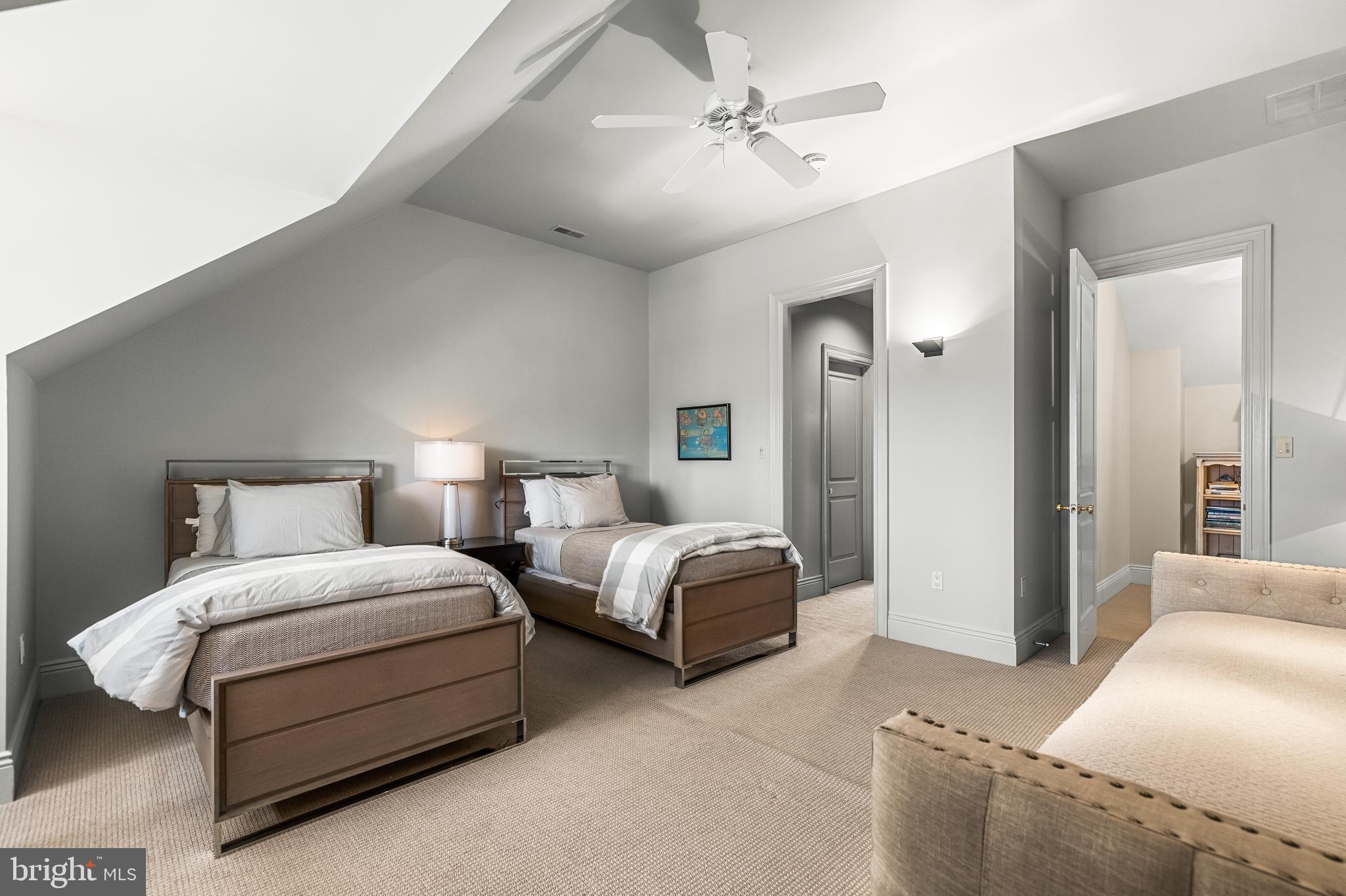 11300 John Carroll Road Owings Mills, MD 21117 - Photo 56 of 102 a bedroom with bed and a chandelier