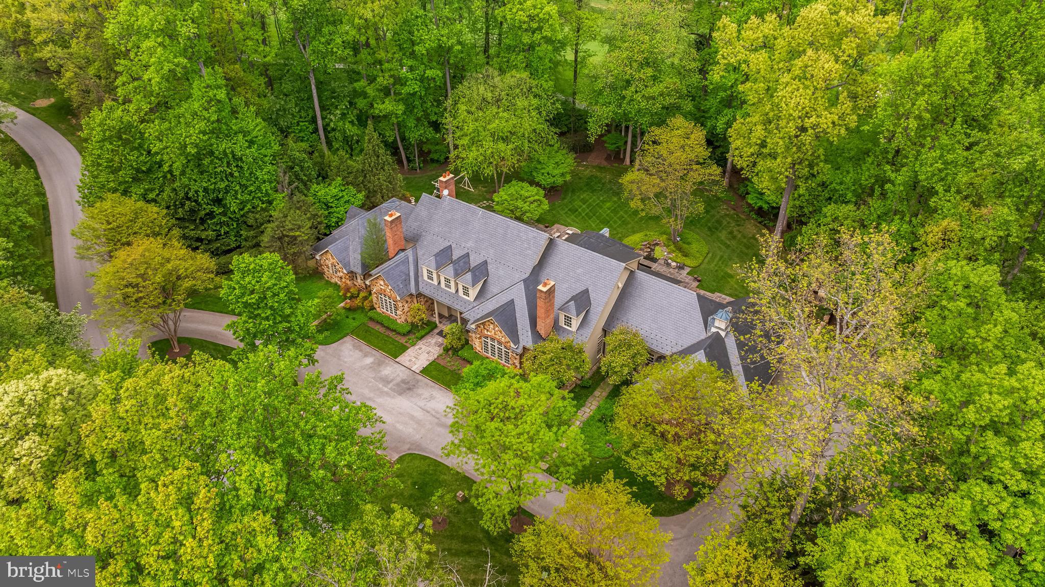 11300 John Carroll Road Owings Mills, MD 21117 - Photo 6 of 102 an aerial view of a house with yard swimming pool and outdoor seating