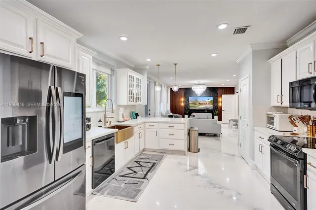 a bedroom with furniture a fireplace and a book shelf